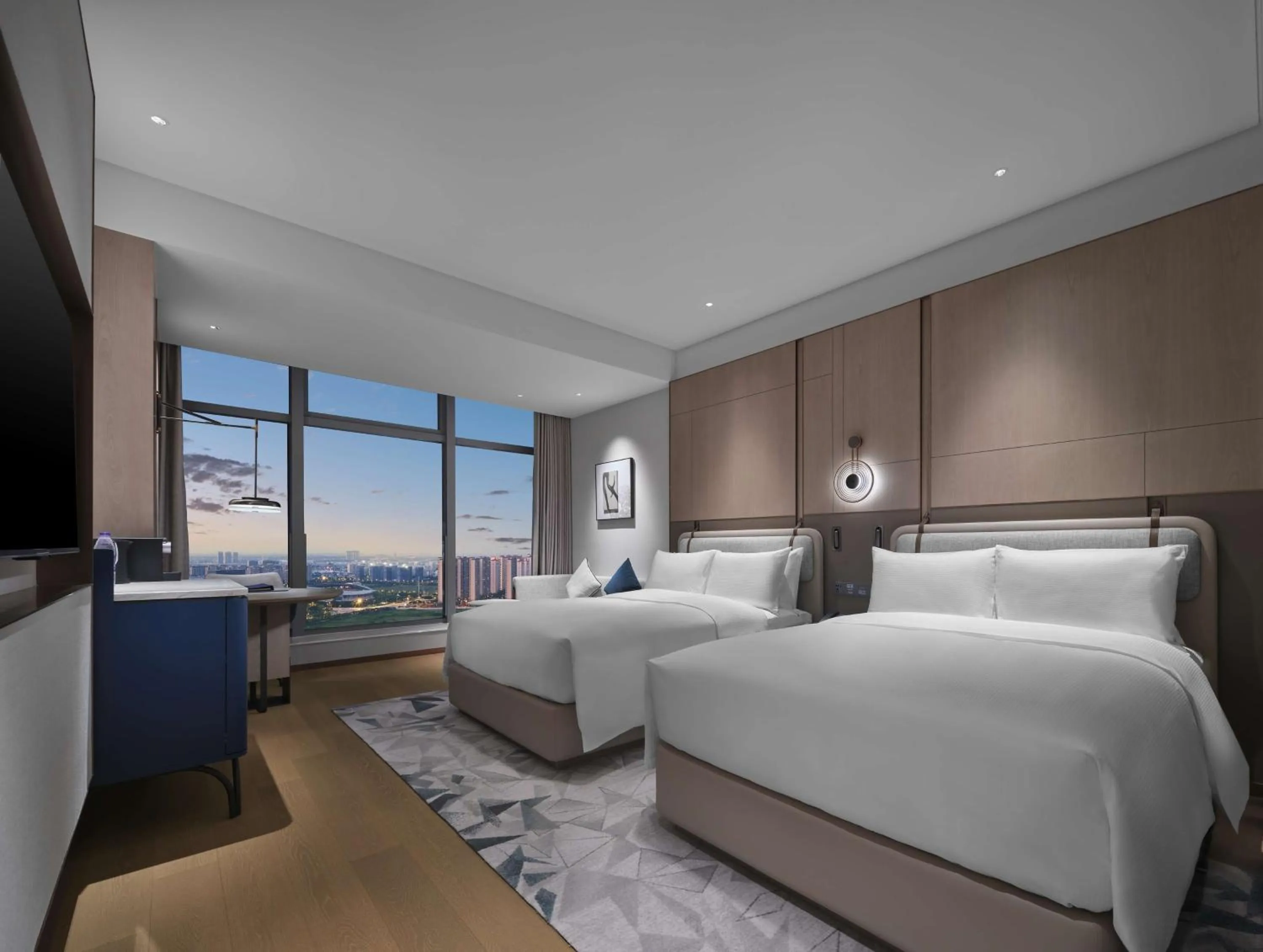 Bed in Doubletree By Hilton Rugao