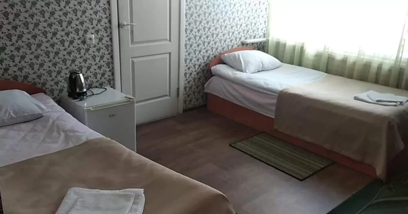 Bed in Hotel Gostynnyi Dvir