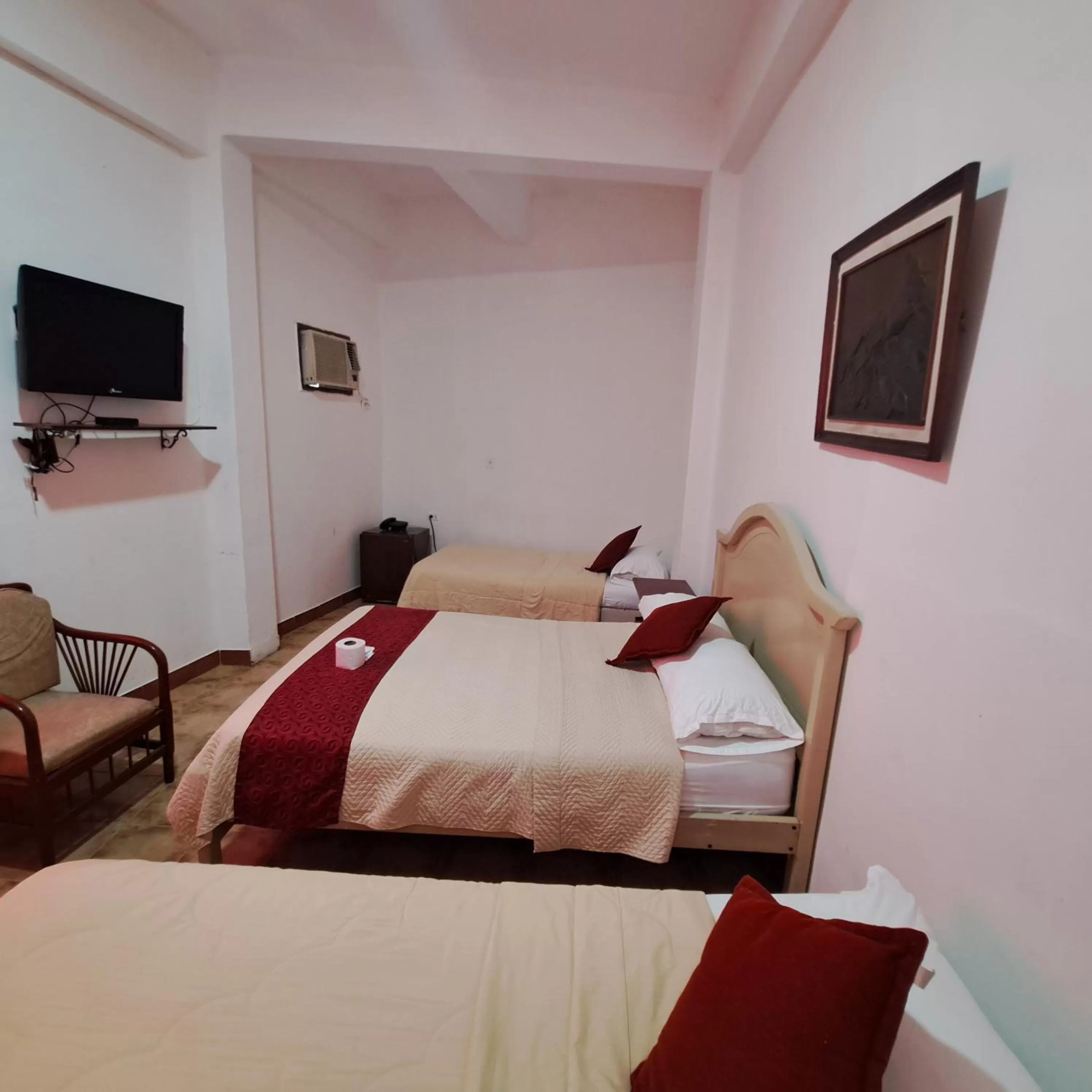 Photo of the whole room, Bed in Atlantic Suites Hotel