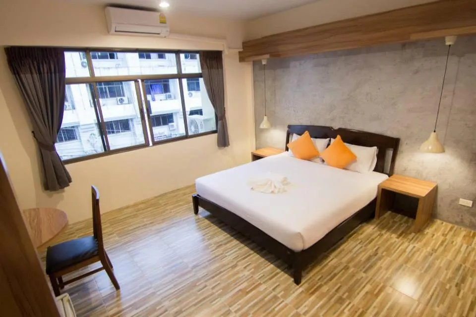 Bed in K.L. Boutique Hotel