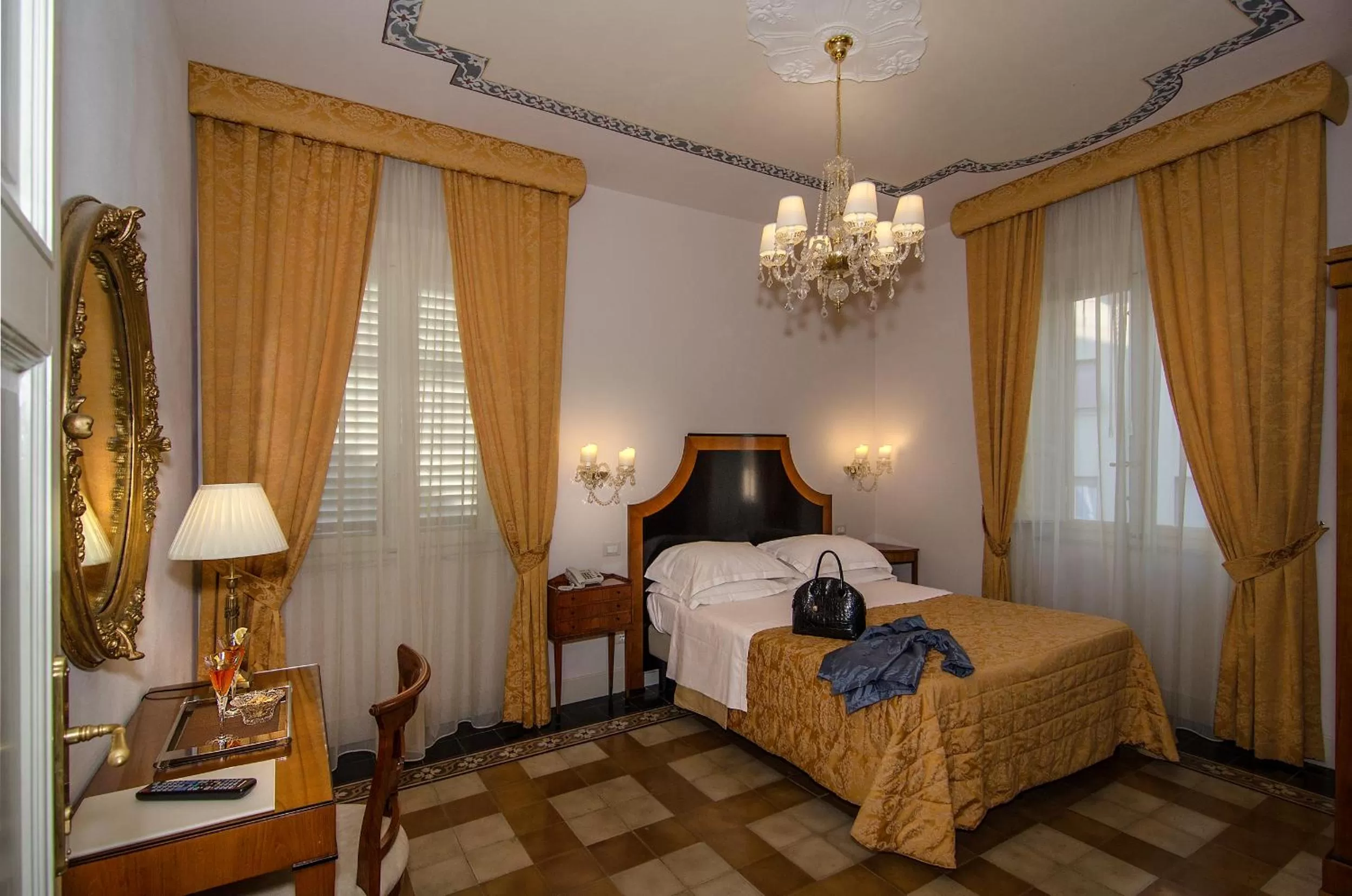 Photo of the whole room, Bed in Lucca in Azzurro Maison de Charme