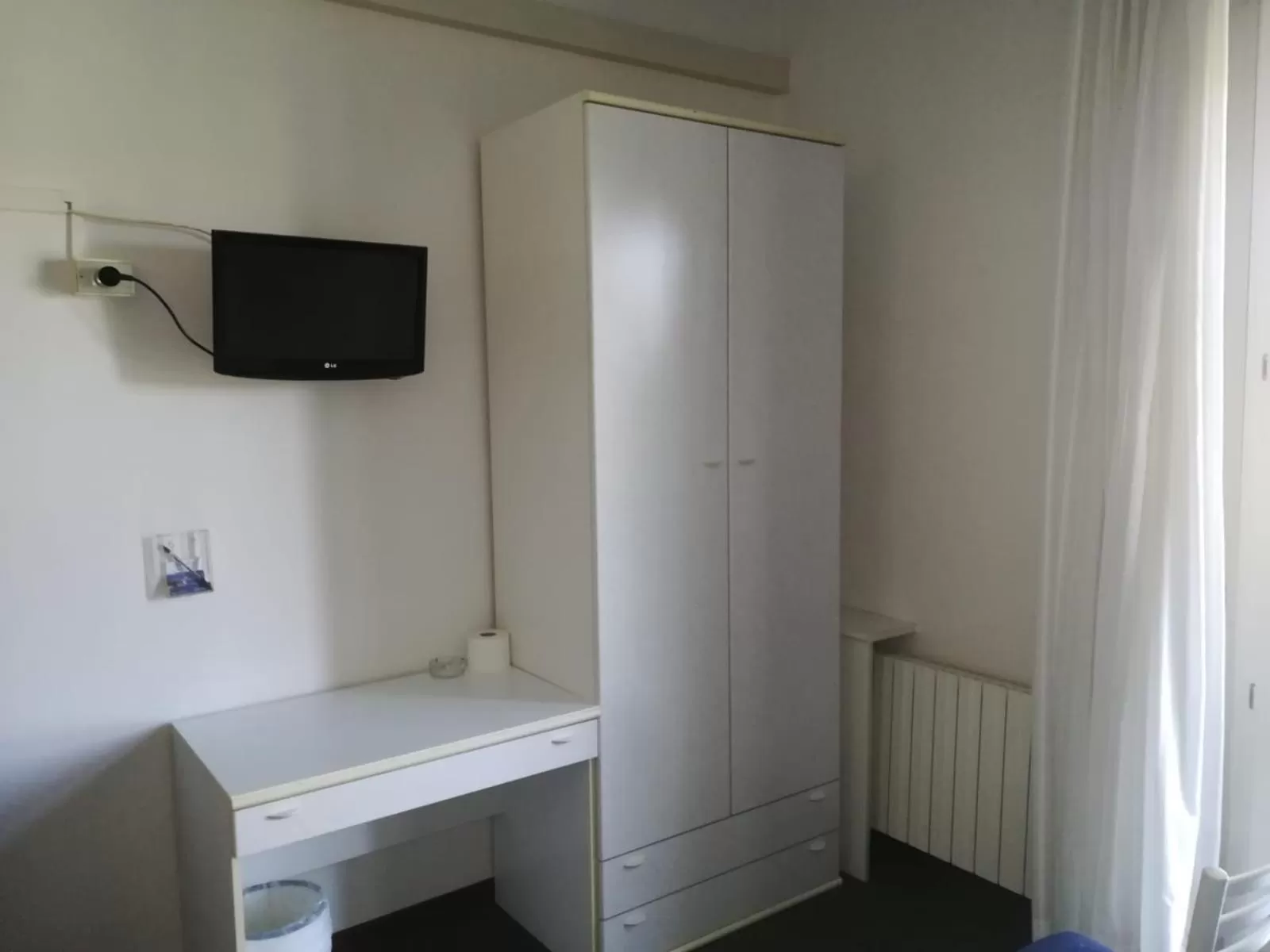 Communal lounge/ TV room in Hotel Tuscolano