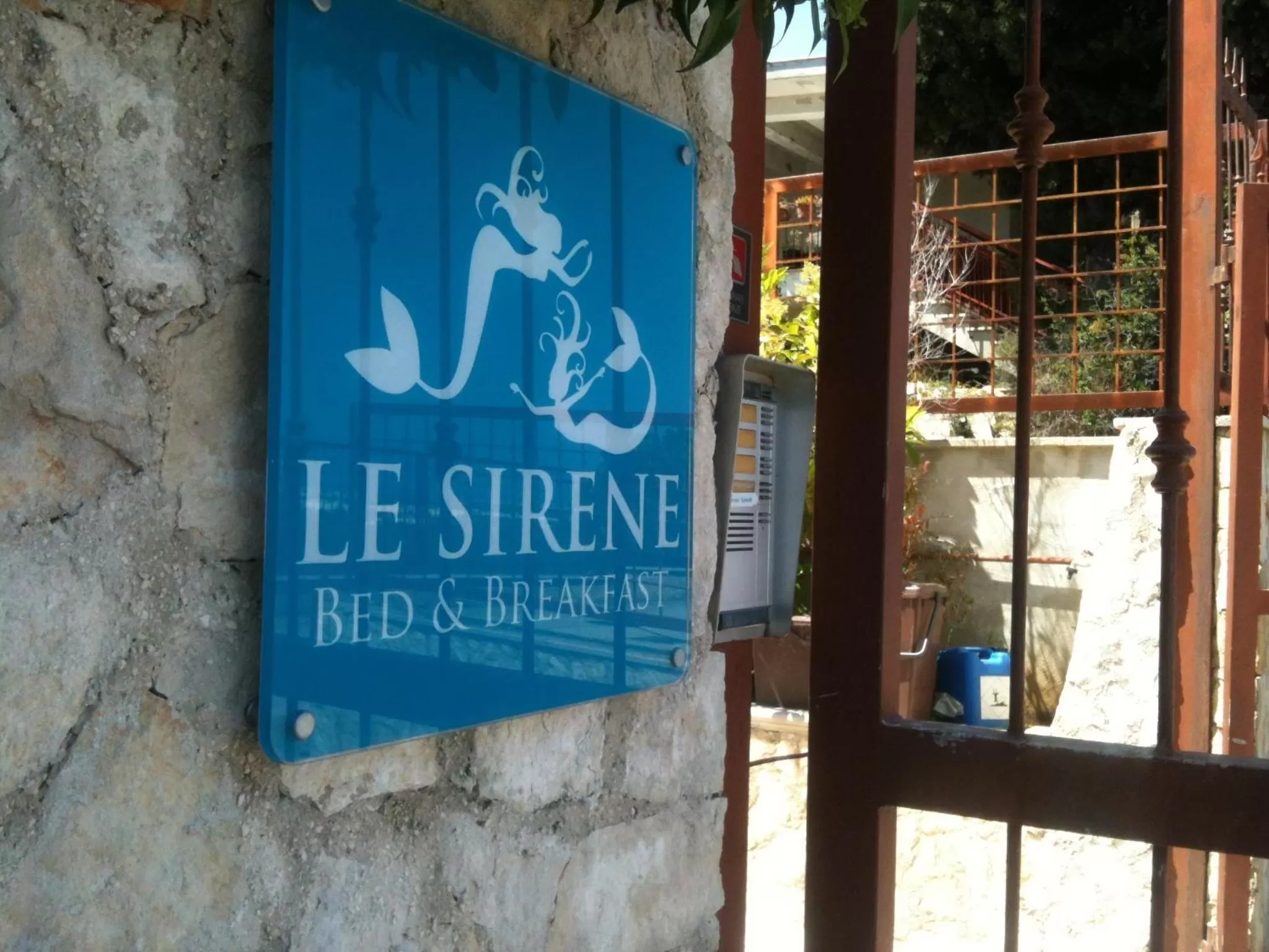 Property logo or sign in Le Sirene Bed and Breakfast