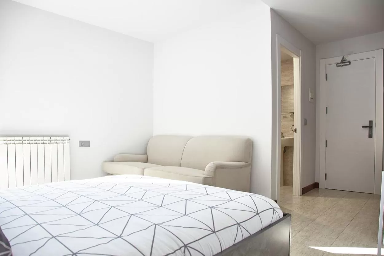 Bed in HOSTAL FONTAÑAN