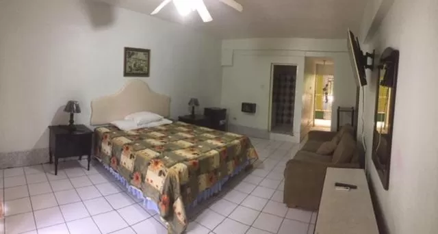 Photo of the whole room, Bed in Negril Beach Club Condos