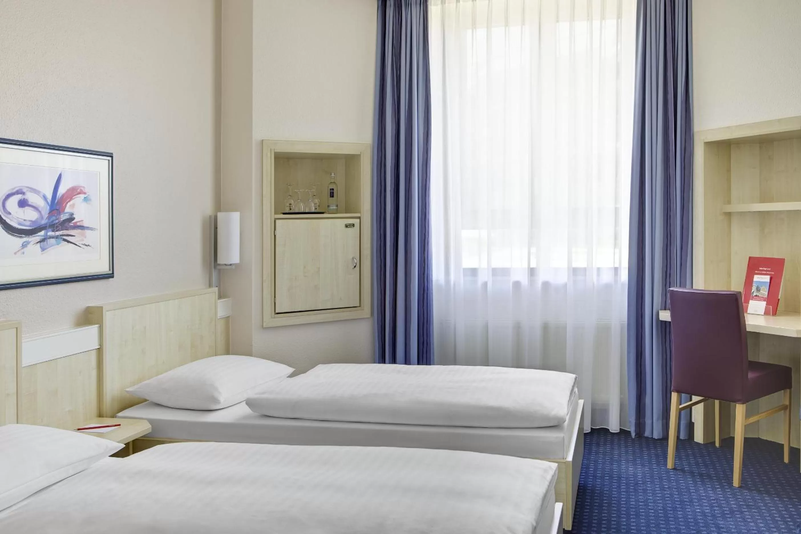 Bed in IntercityHotel Kassel