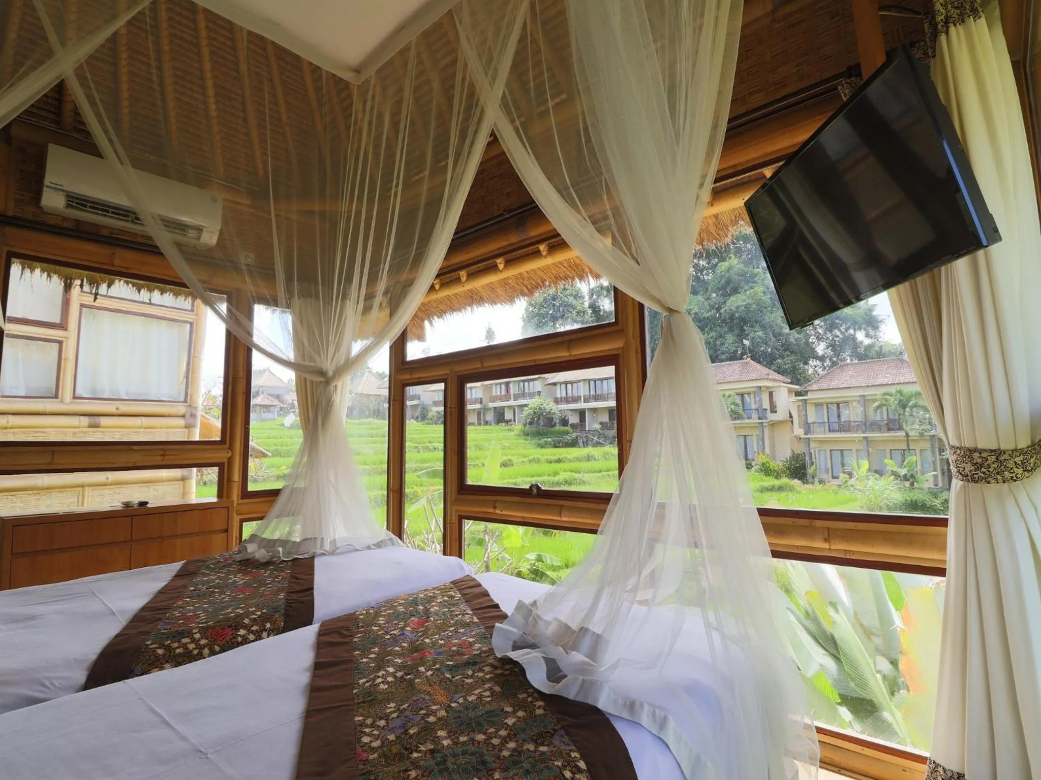 Bed in Biyukukung Suite & Spa