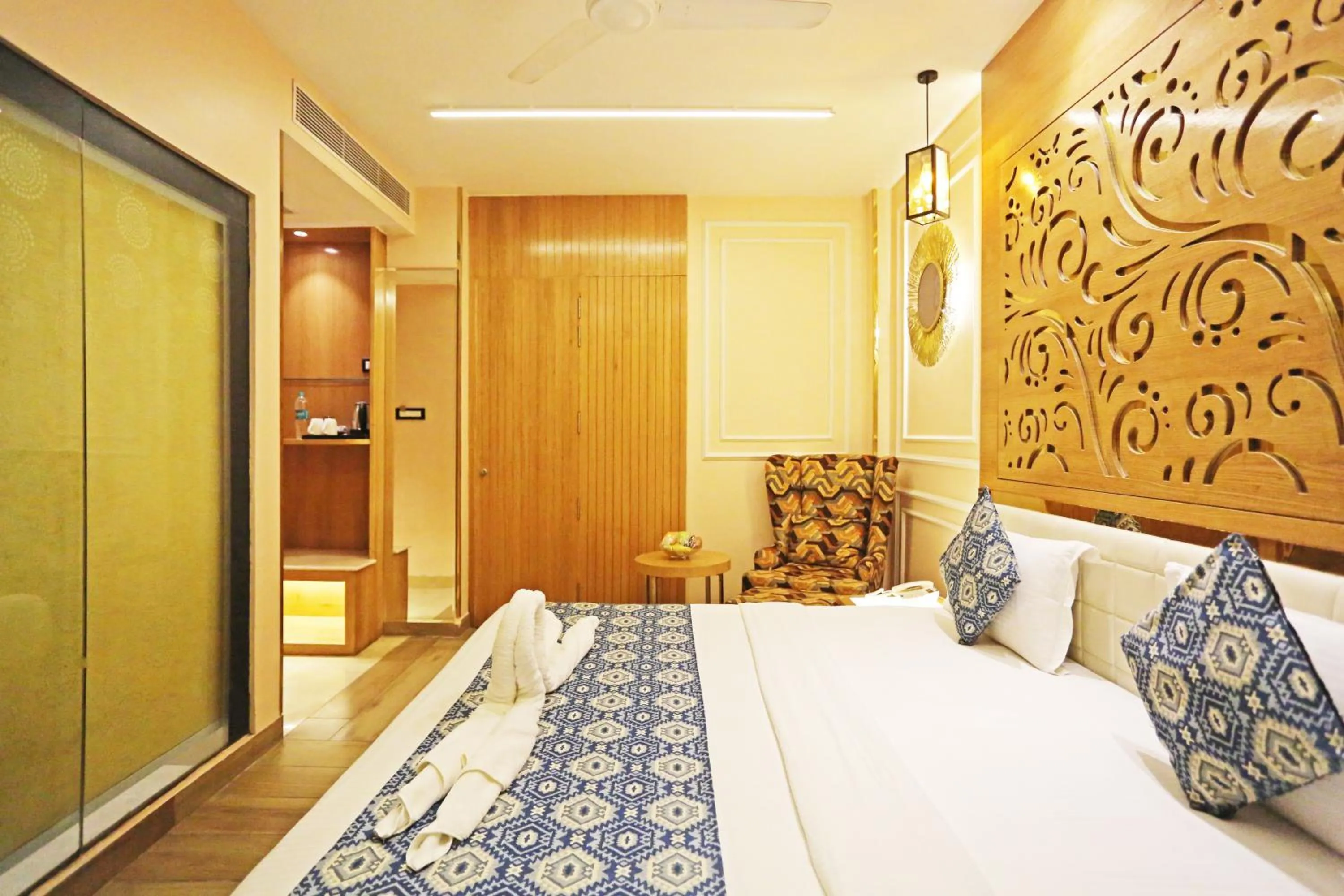 Bed in JRD Luxury-Business Hotel