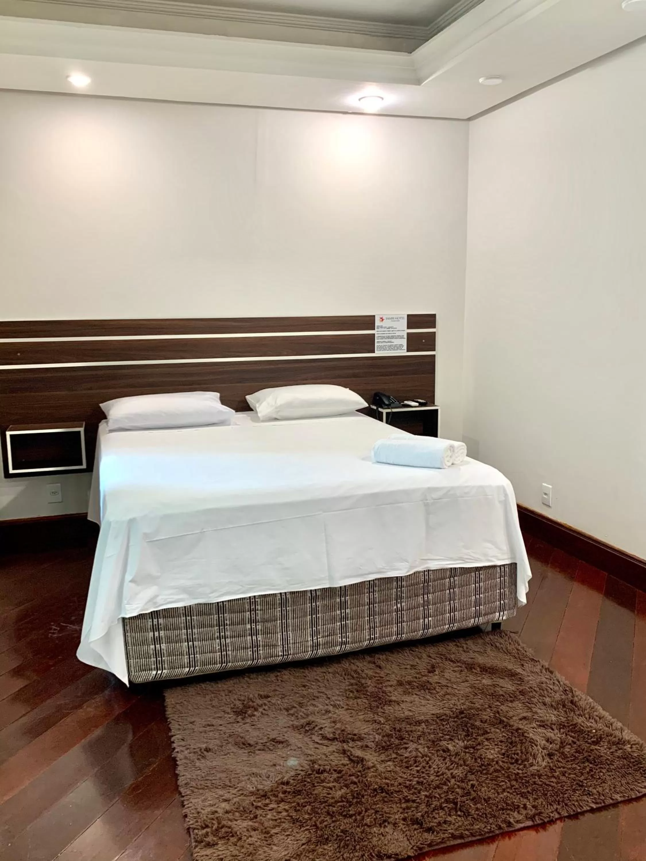 Bed in SAMIR HOTEL COMFORT