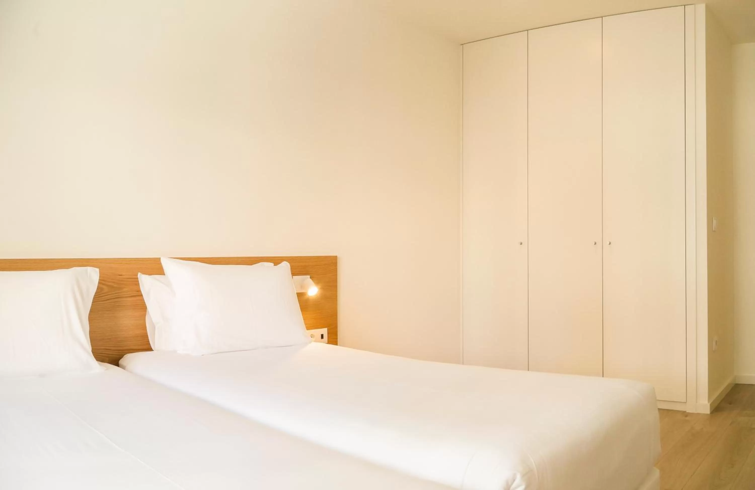 Bed in Hotel Spot Family Suites