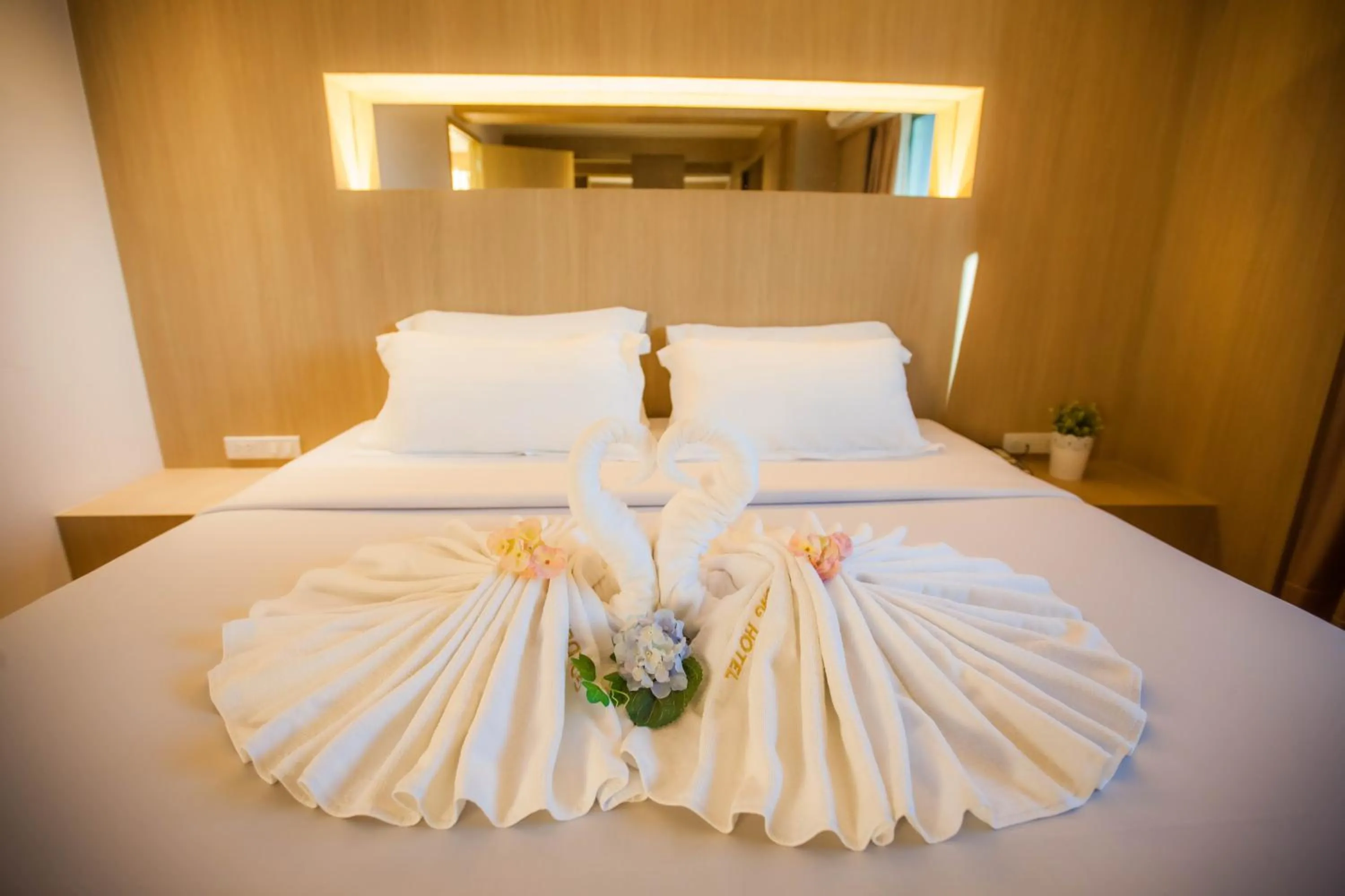 Bed in Golden City Rayong Hotel