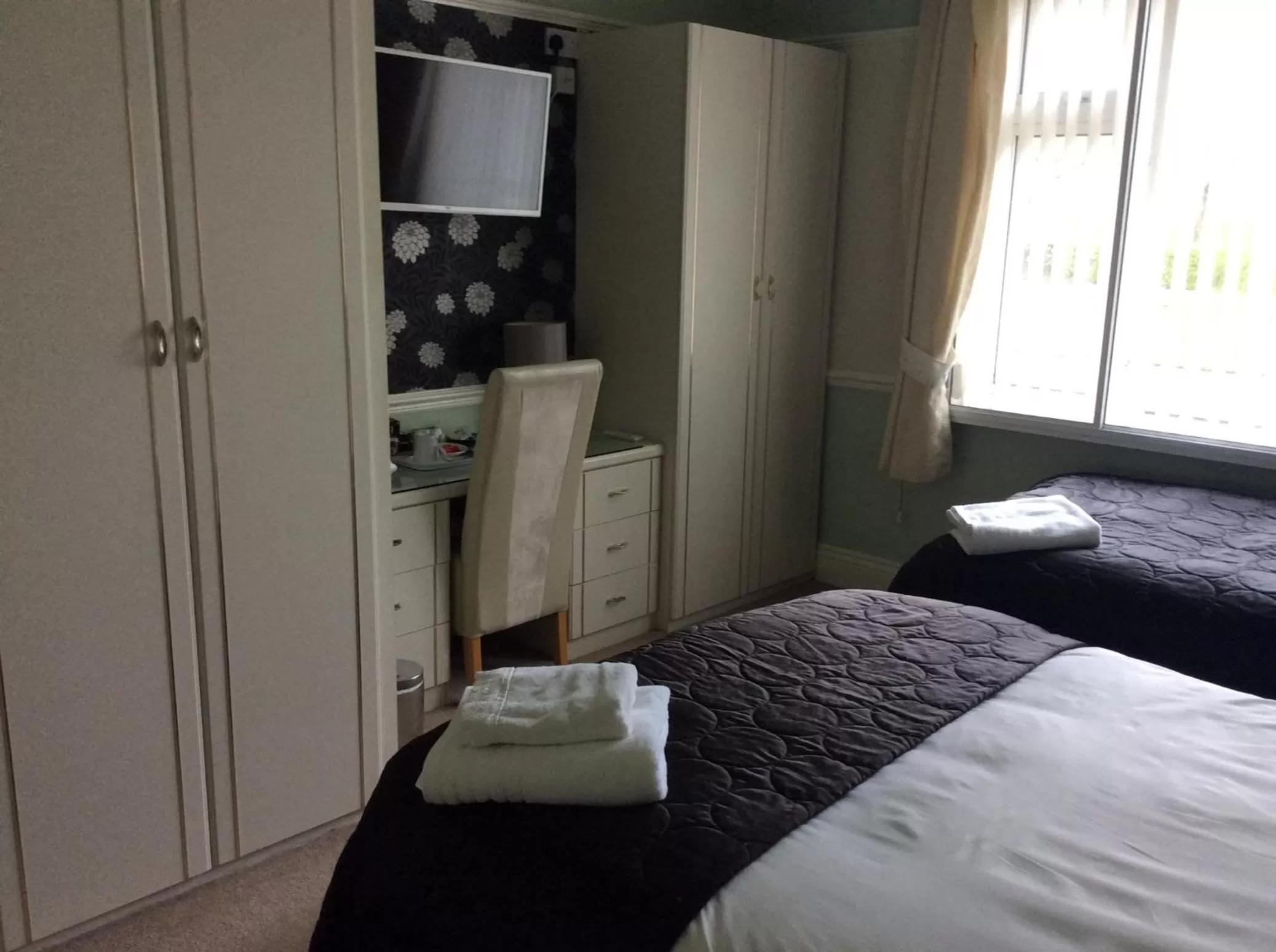 Bed in Alma Lodge Guest House