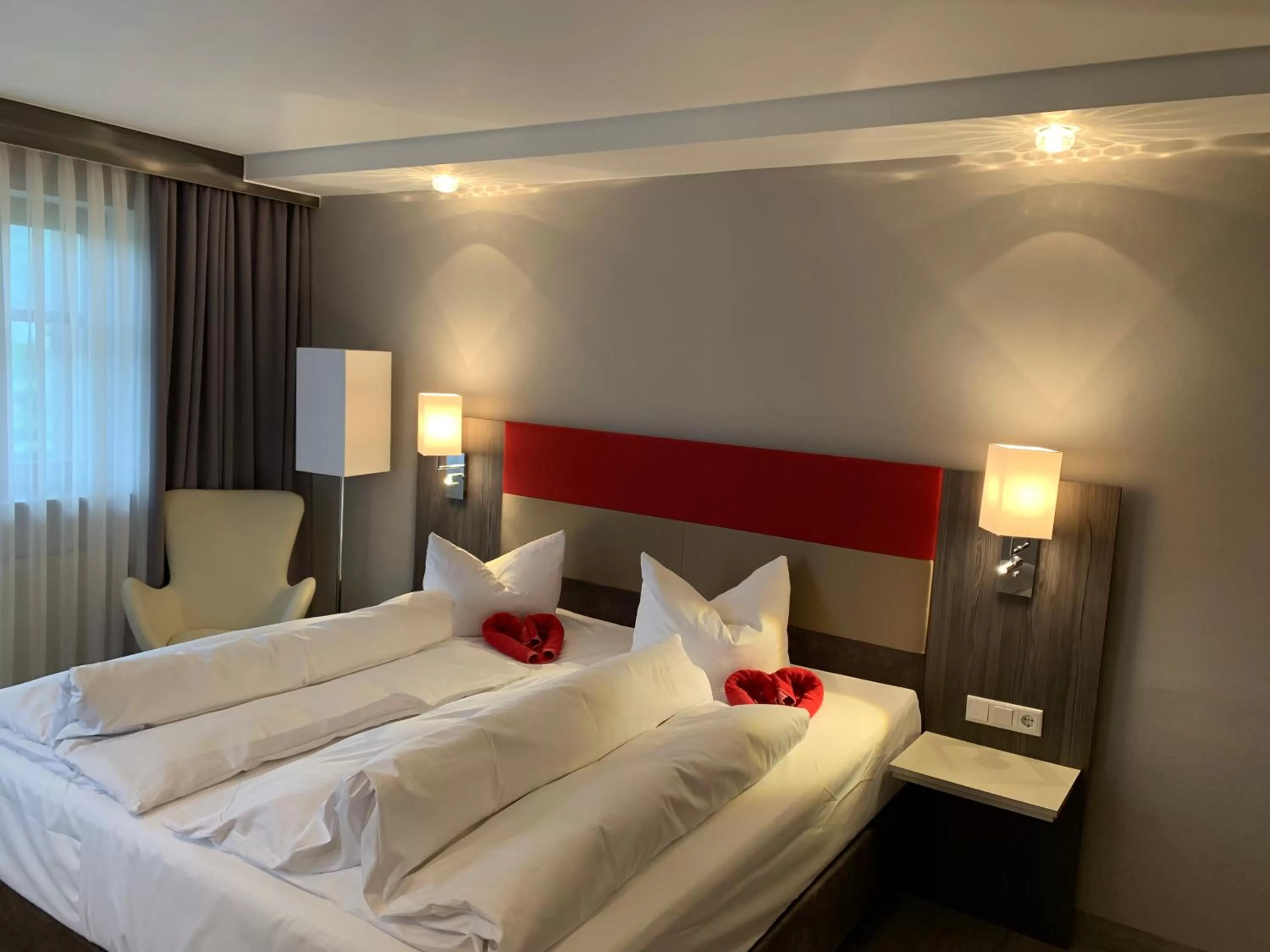 Photo of the whole room, Bed in Sporthotel Bernrieder Hof GmbH