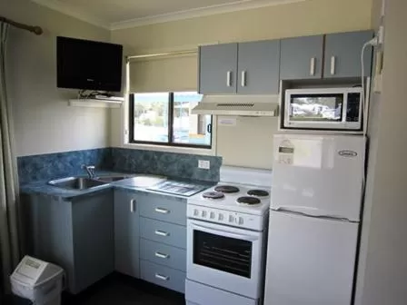 Kitchen or kitchenette in Woolgoolga Beach Holiday Park