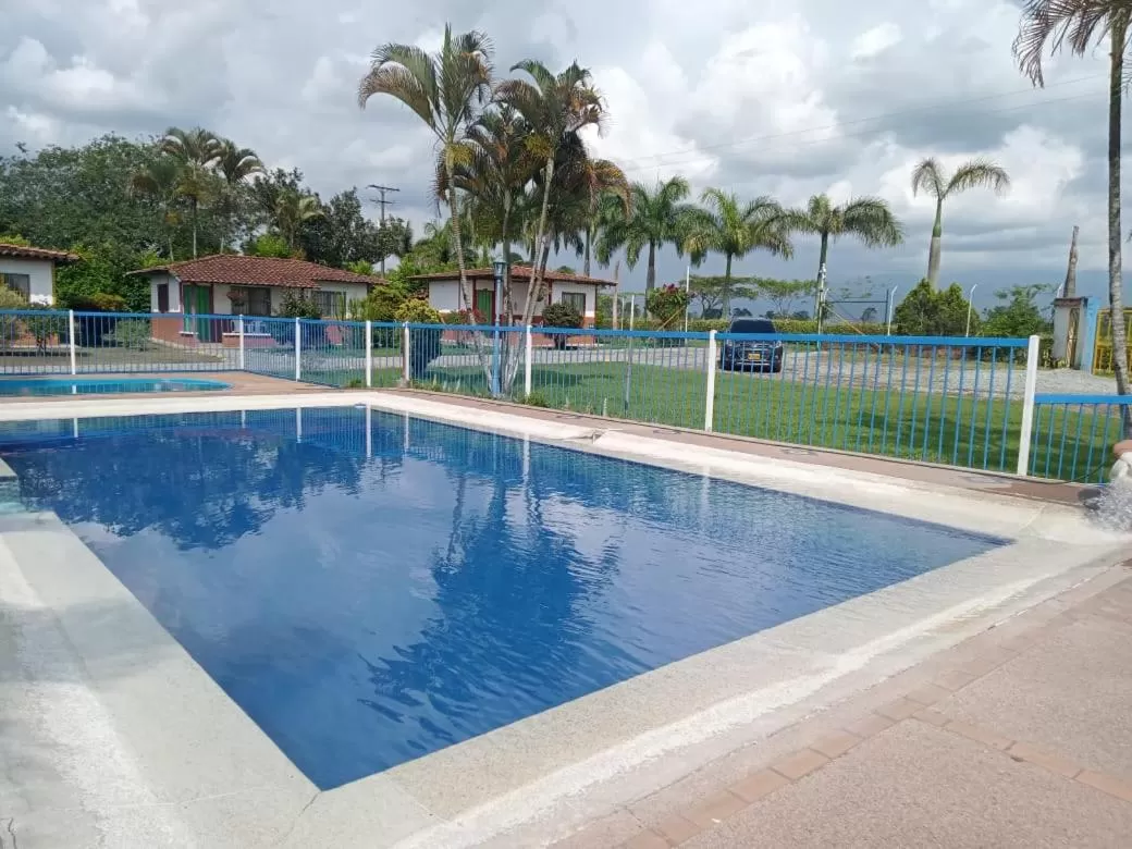 Swimming Pool in Finca Hotel Cabañas del parque