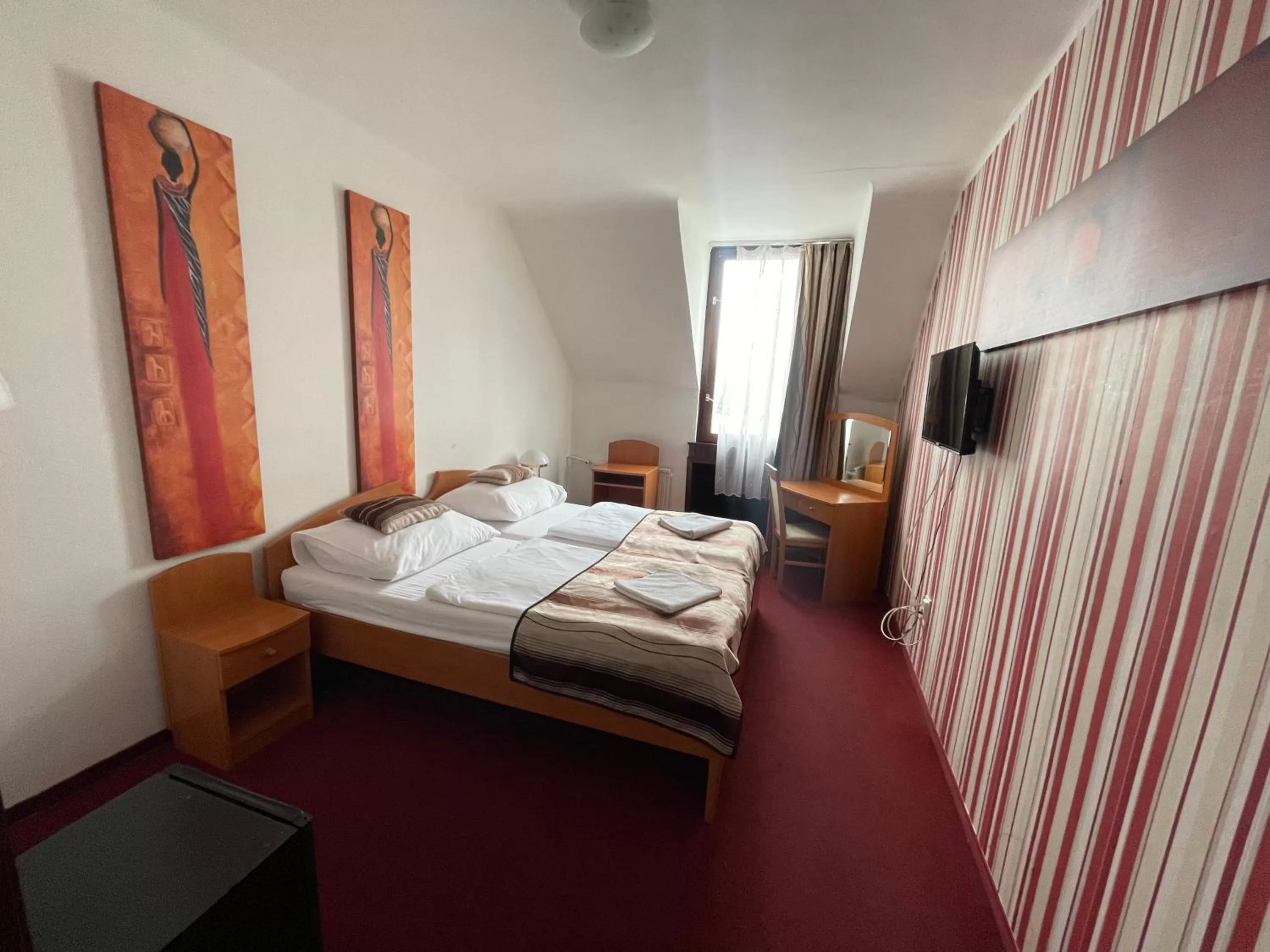 Bed in Hotel Minaret&Étterem