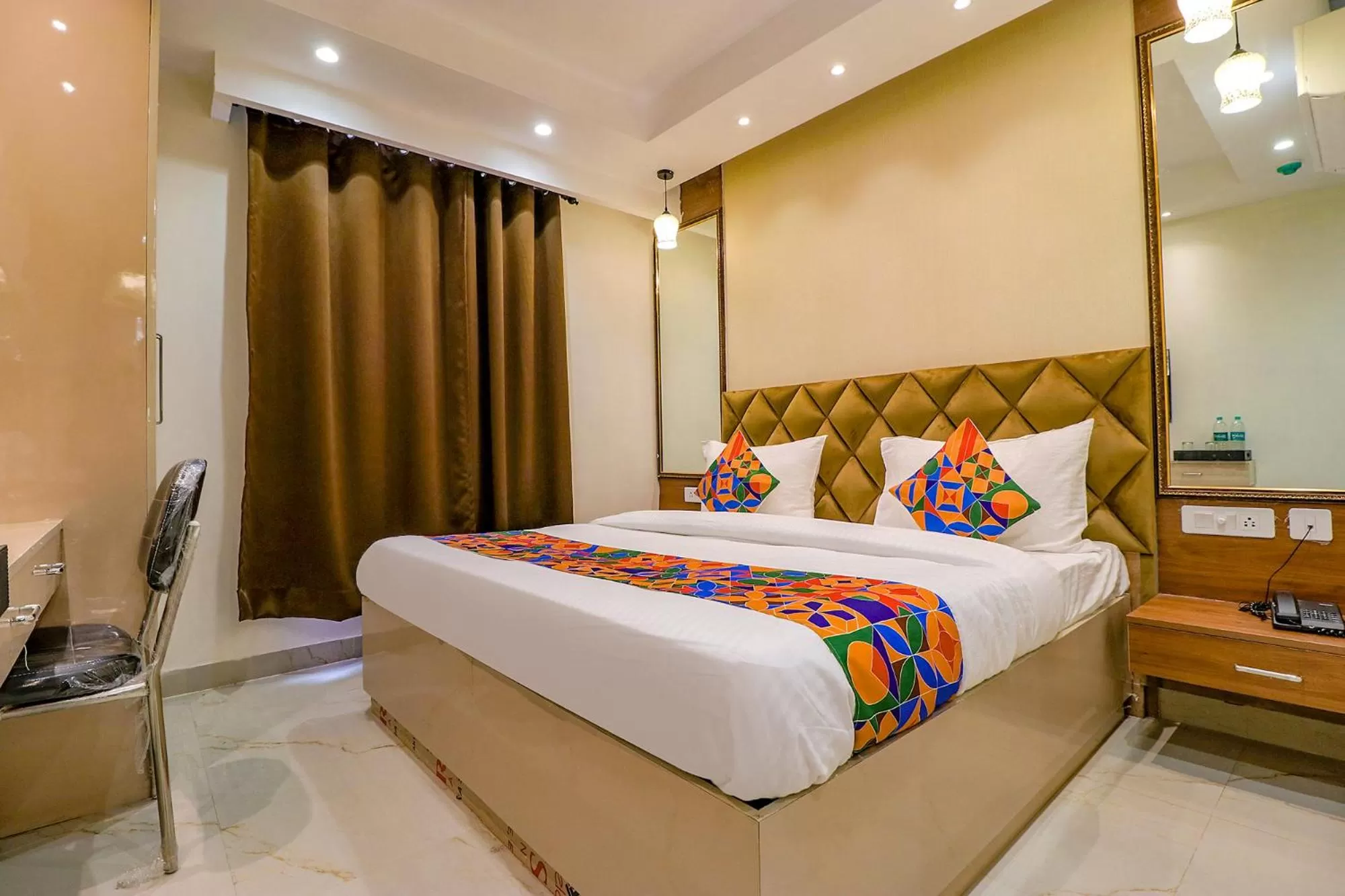 Bed in FabHotel Pitampura