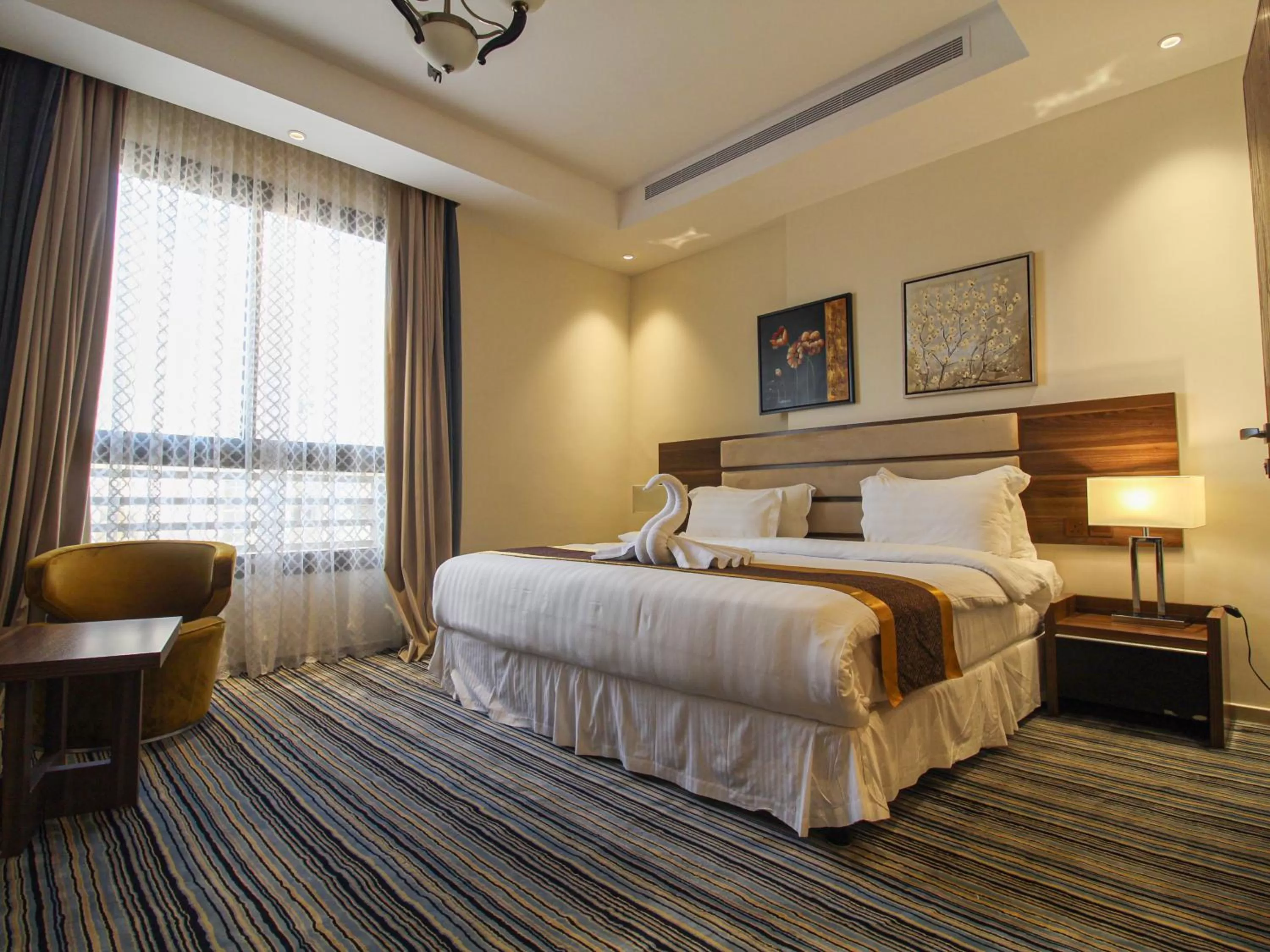 Bed in Friesian Hotel Suites