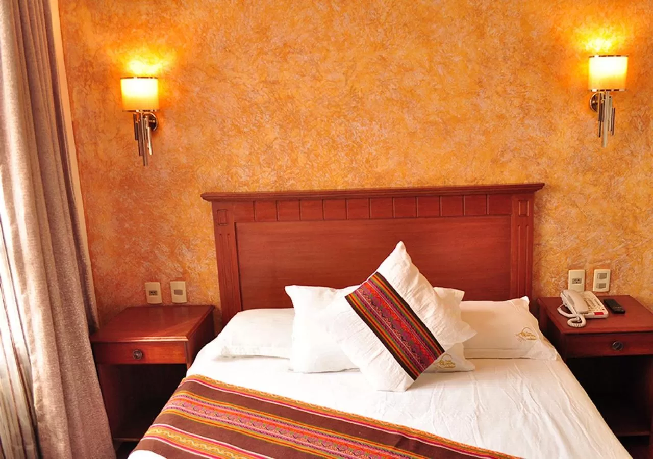 Photo of the whole room, Bed in Qantu Hotel