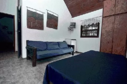 Bed in Pousada A Marca do Faraó