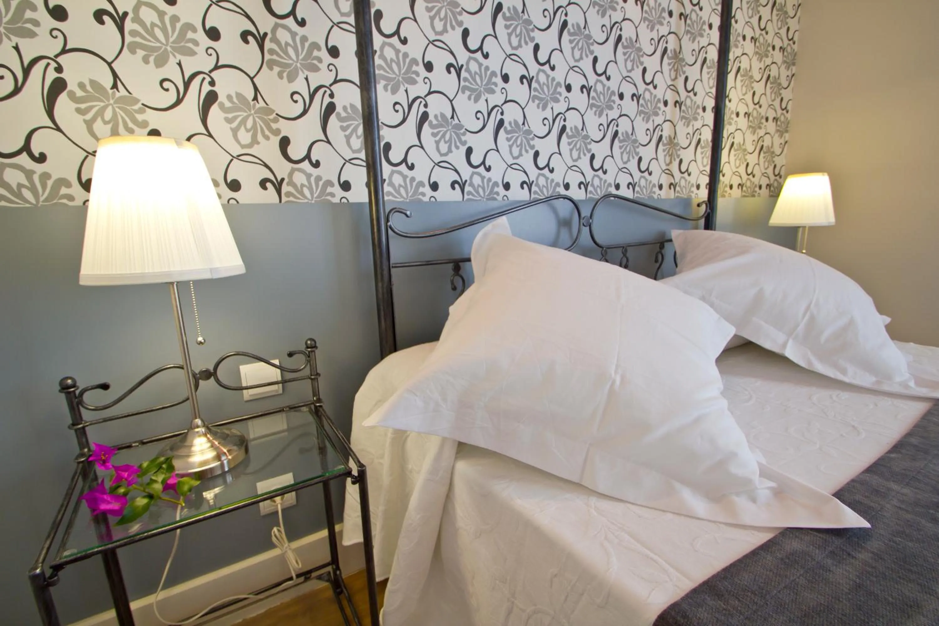 Bed in Villa Arce Hotel