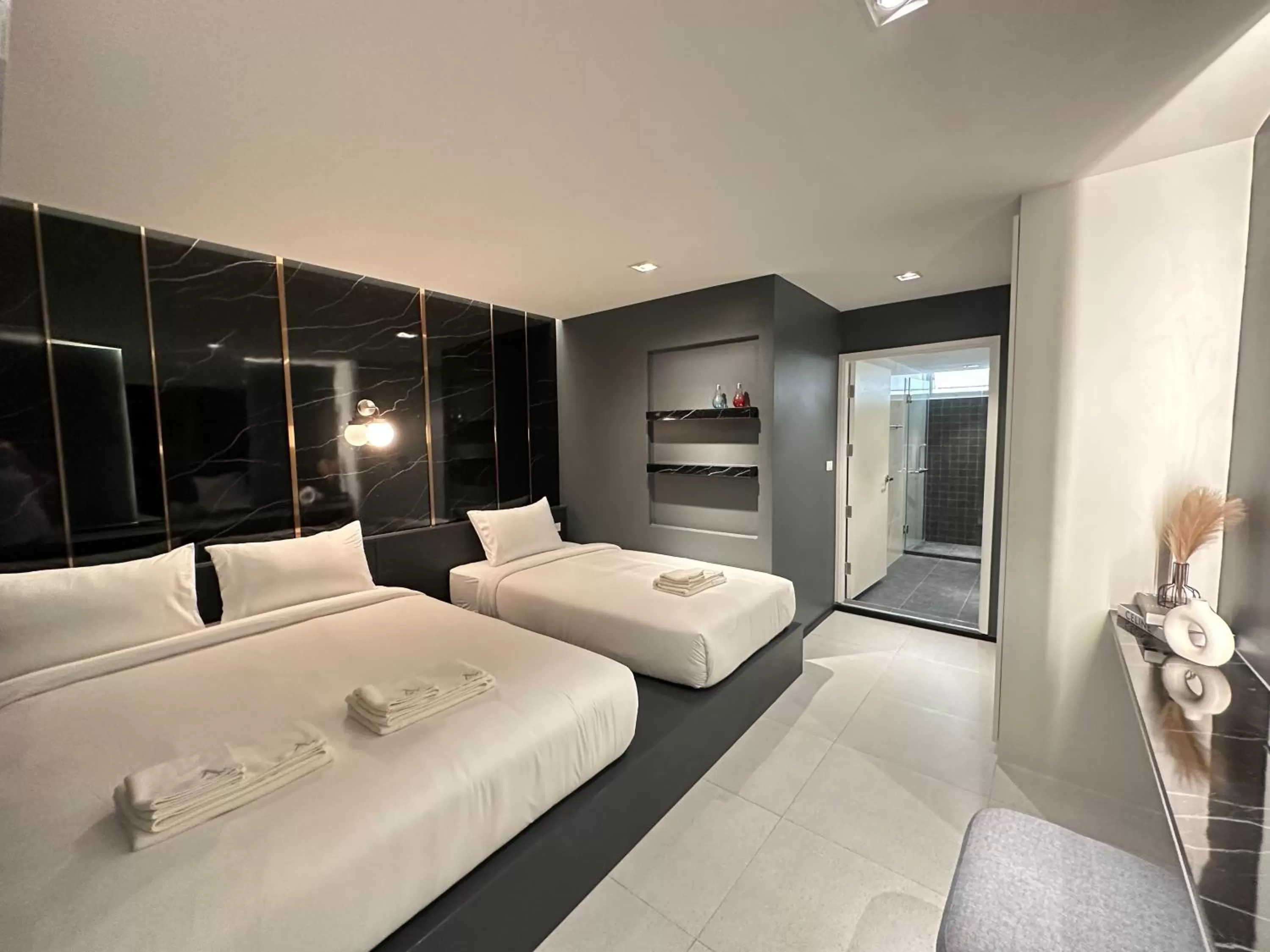 Bed in Ascella Bangkok Hotel