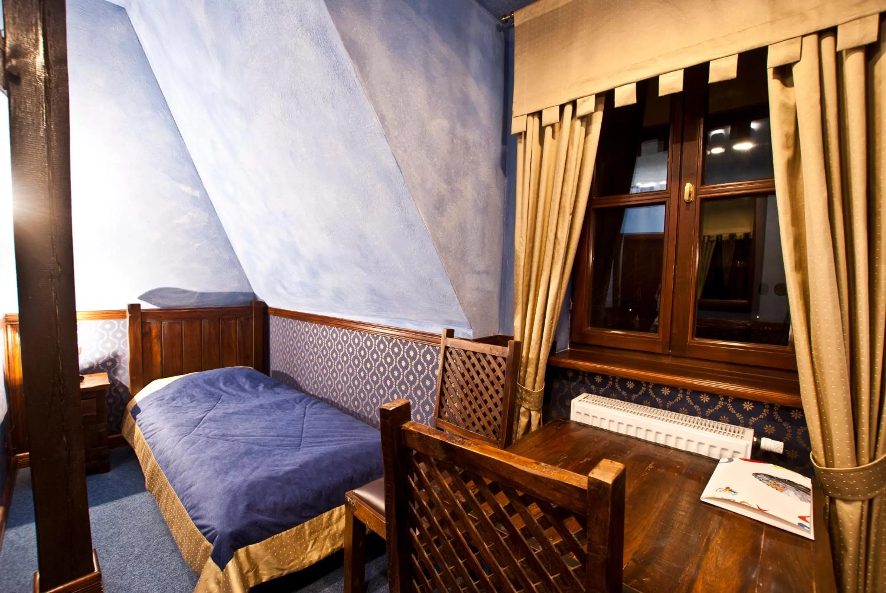 Bed, Seating Area in Zamek Uniejów