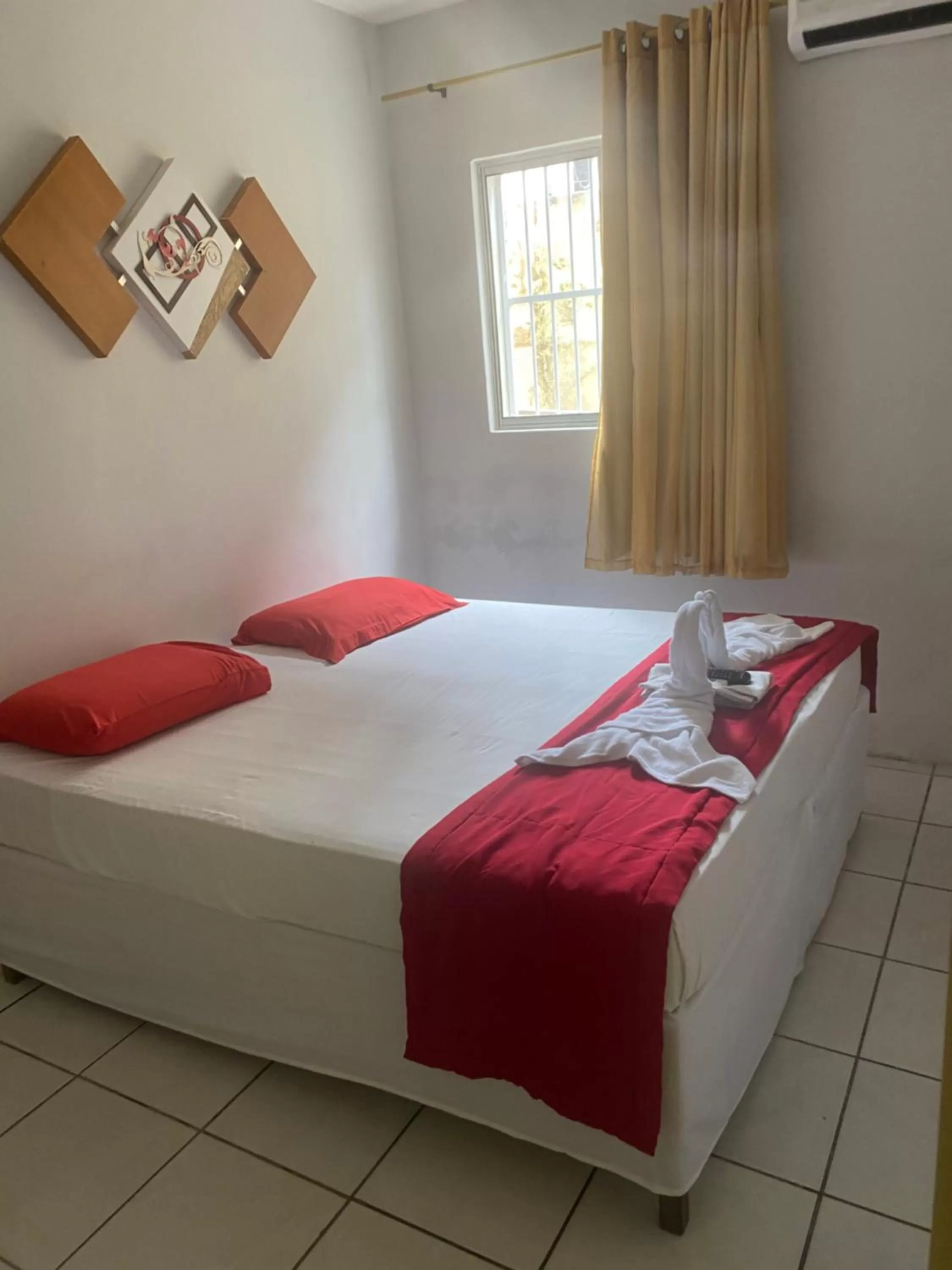 Bed in Nalu Beach Hotel pousada