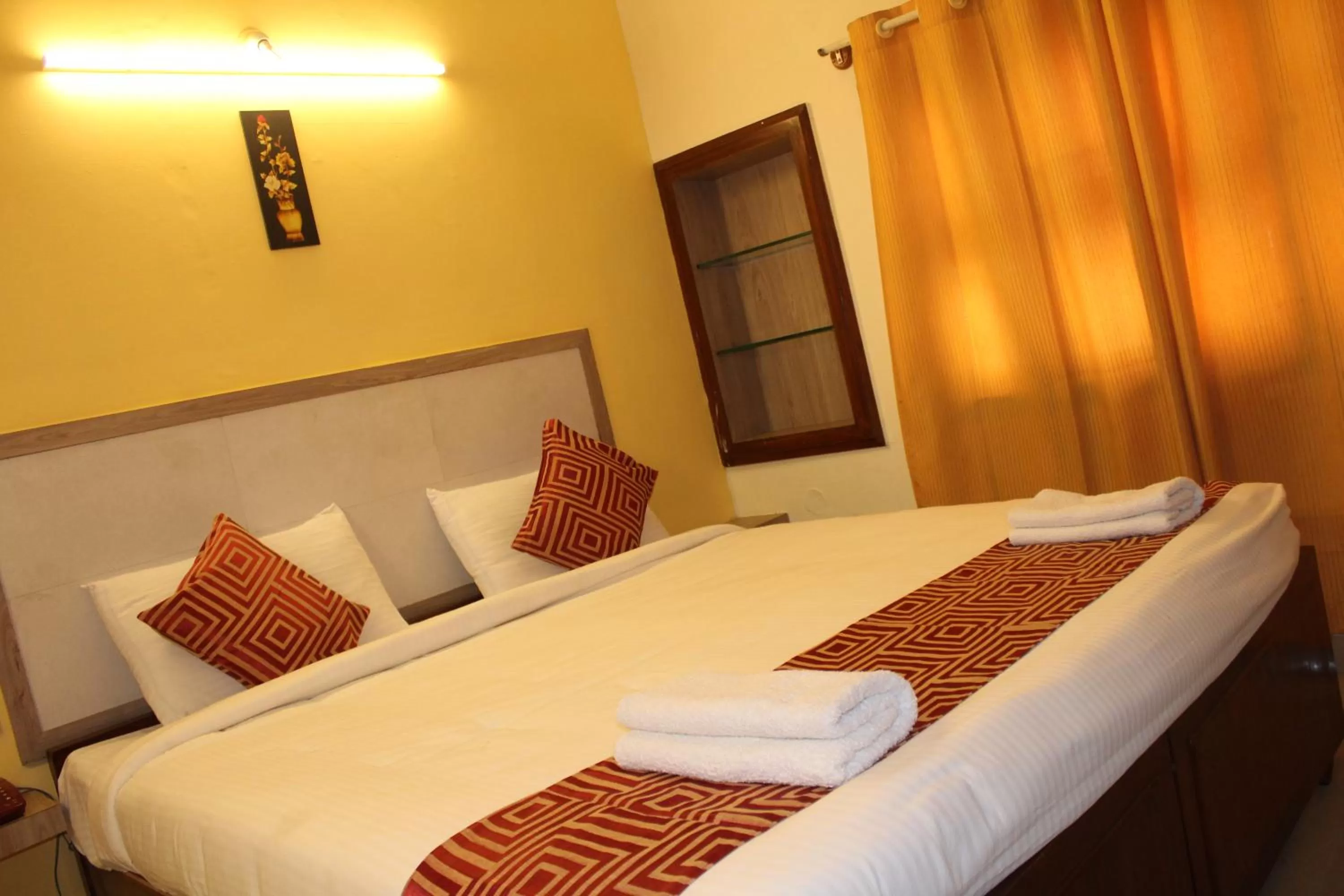 Bed in Hotel Kaveri