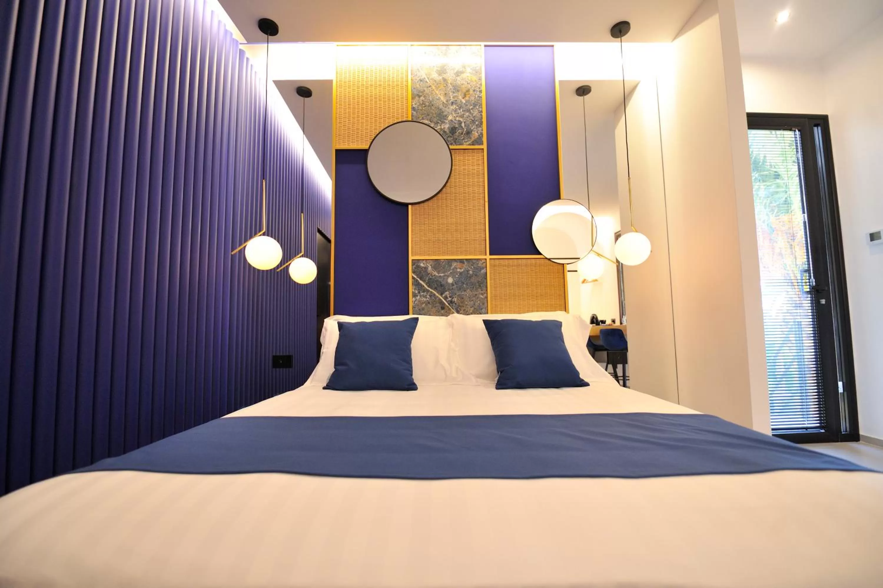 Bed in Emesh Boutique Suite