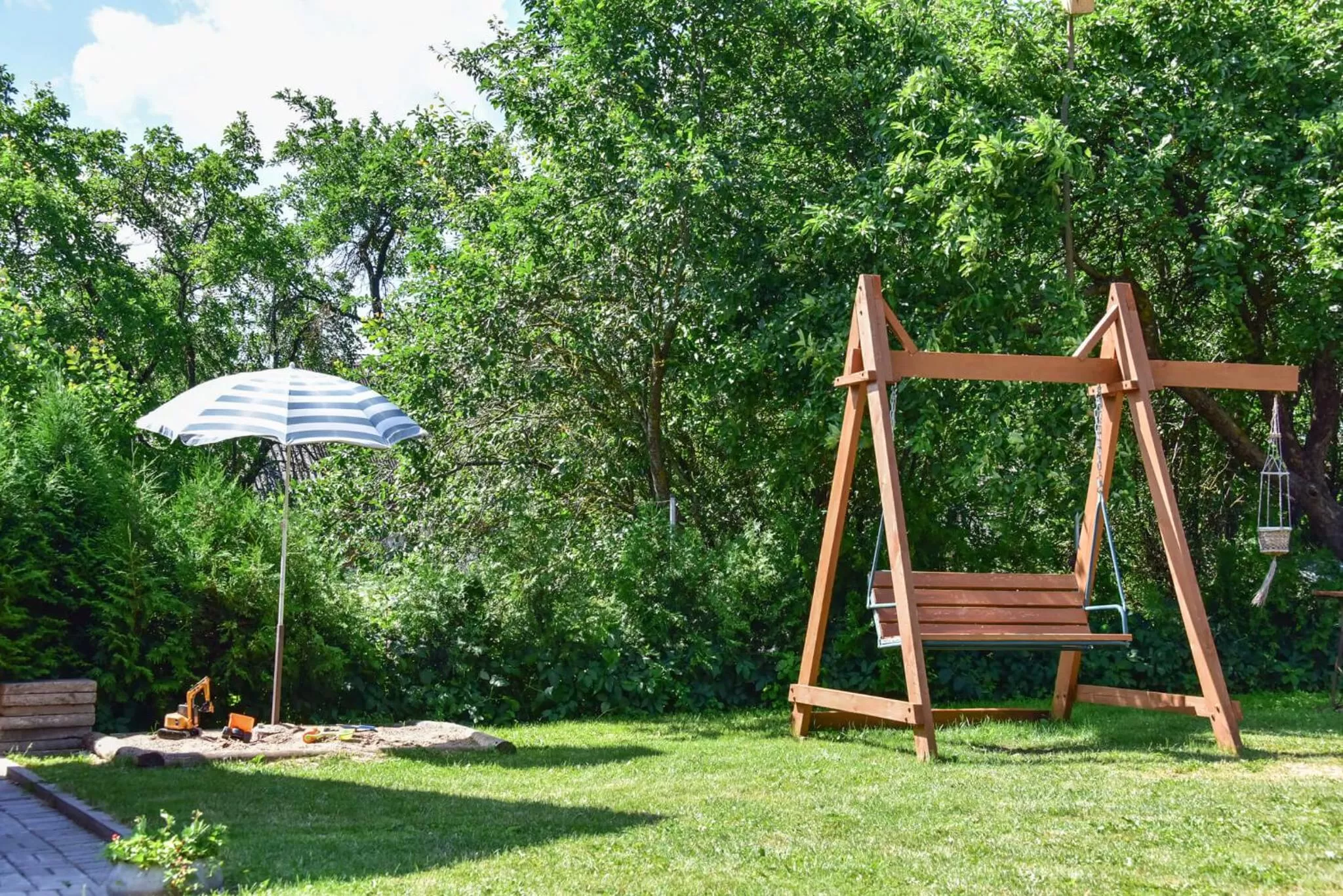 Children play ground, Garden in "Trakaitis" apartments in Villa