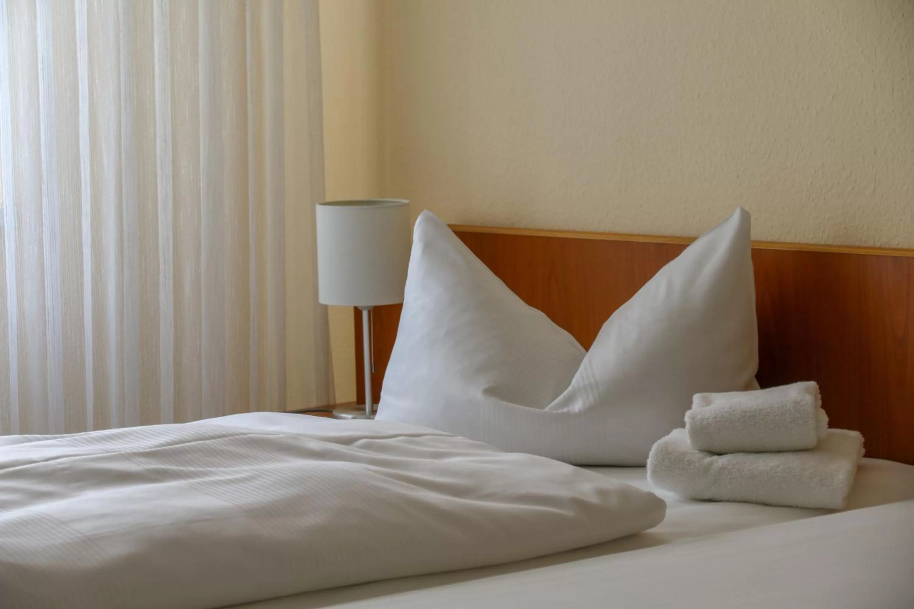 Bed in Hotel Stadt Mühlhausen