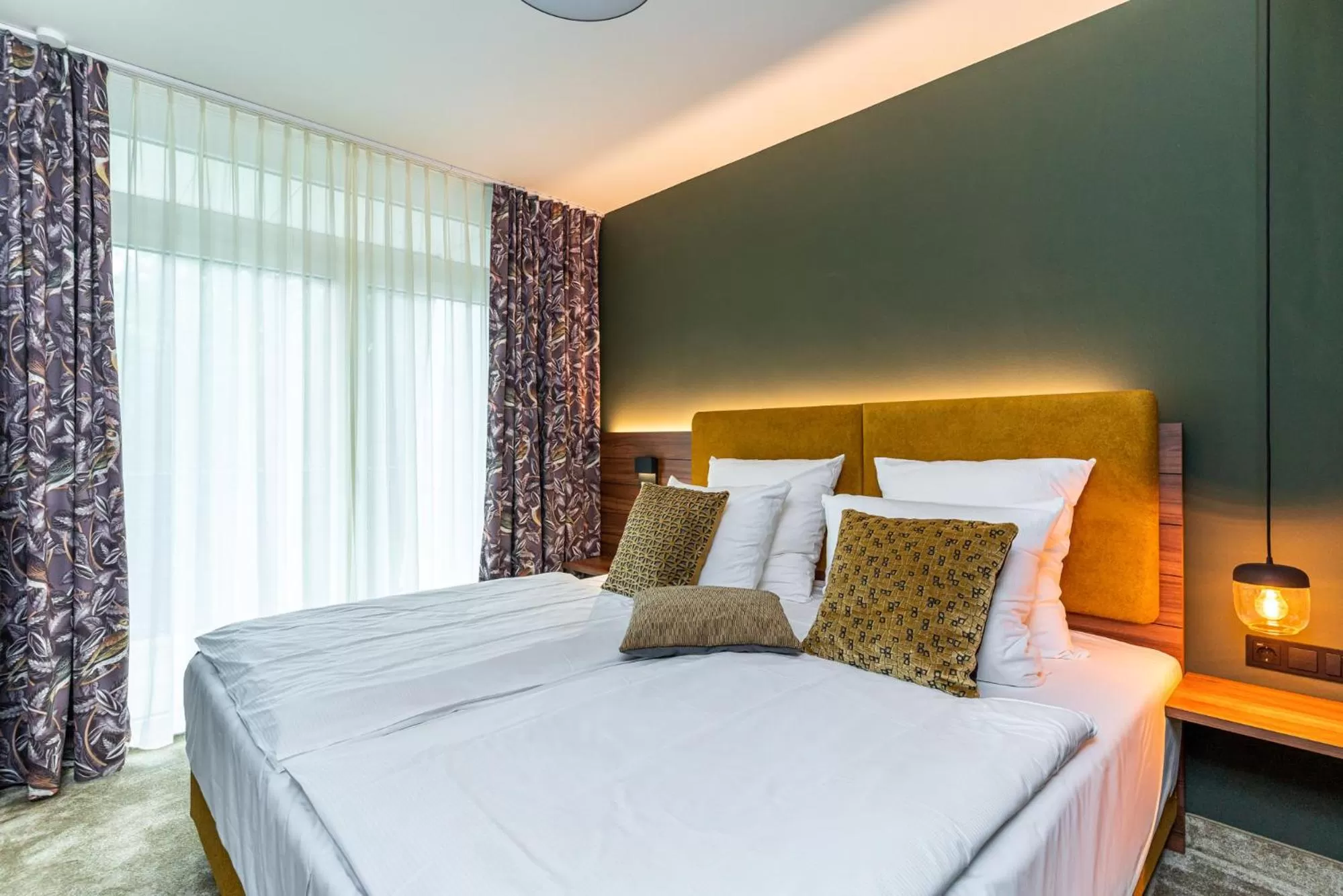 Bed in Waldhotel Tannenhäuschen