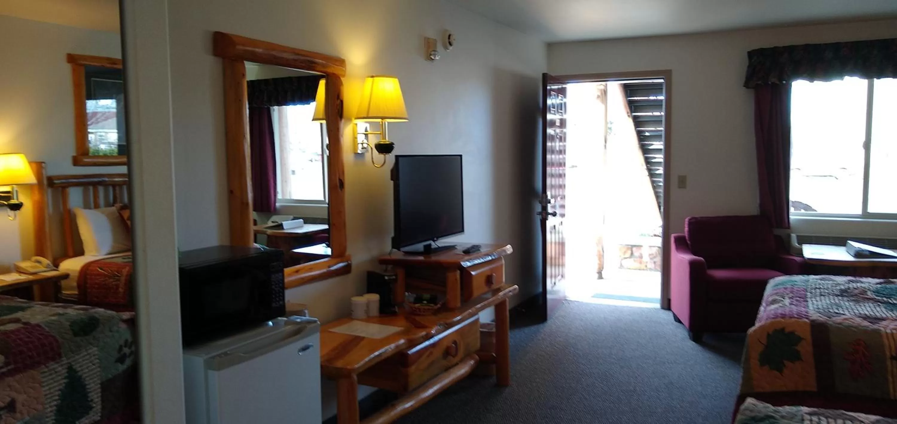 Bed in Ponderosa Motel