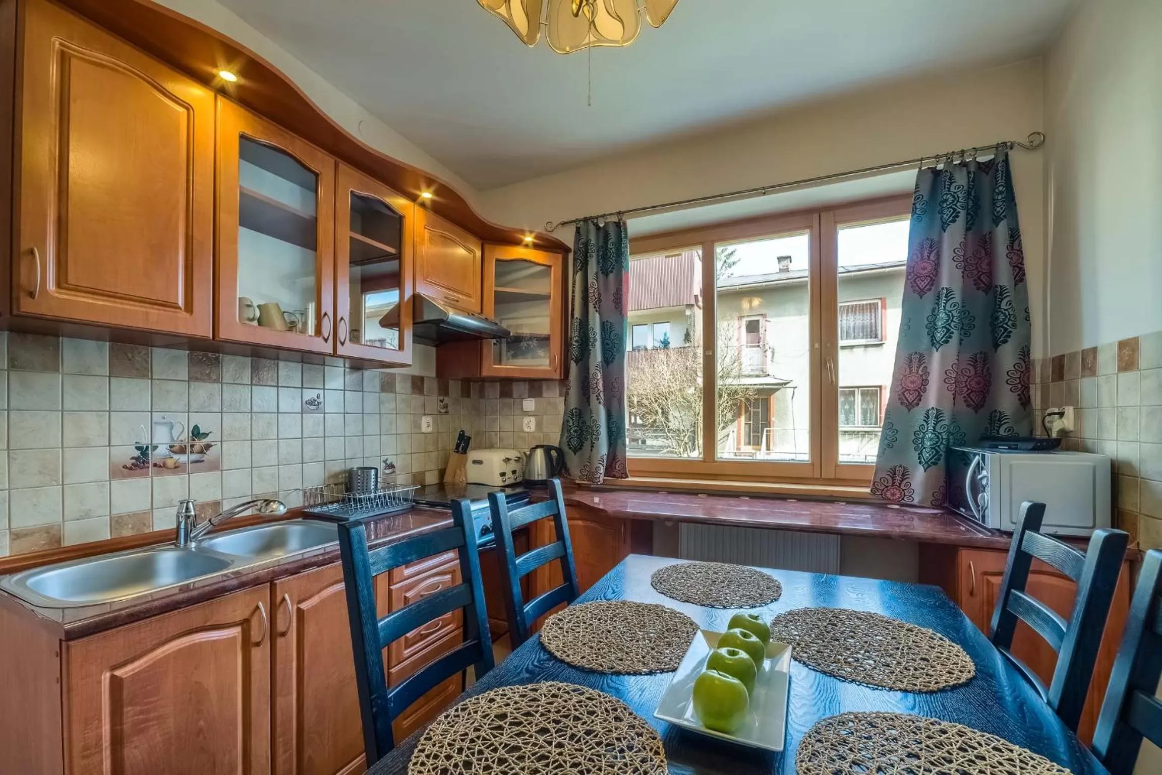 Kitchen/Kitchenette in Aparthotel Delta Garden