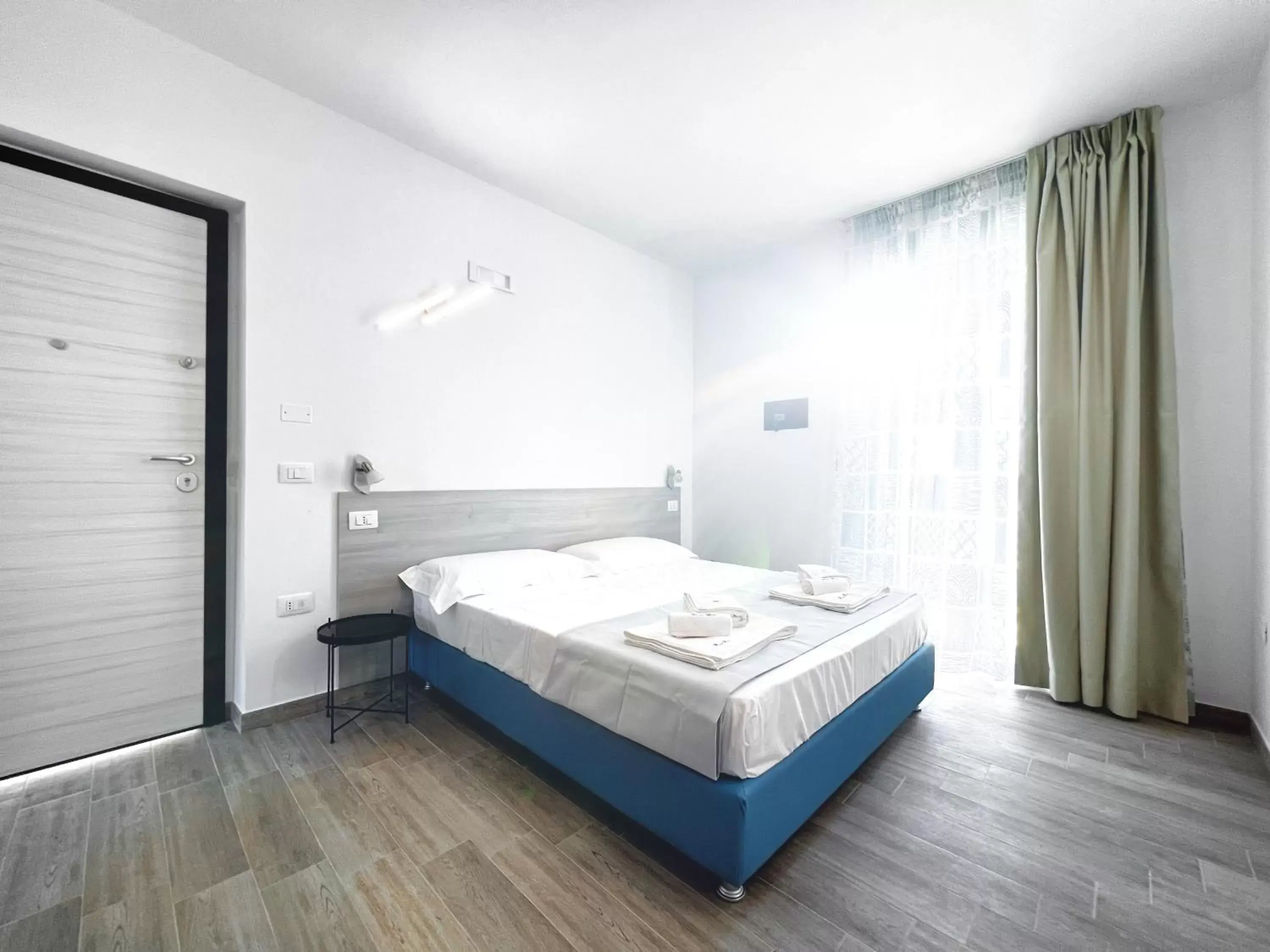 Quadruple Room with Balcony in Perla Blu Tropea Quadruple Room with Balcony in Perla Blu Tropea
