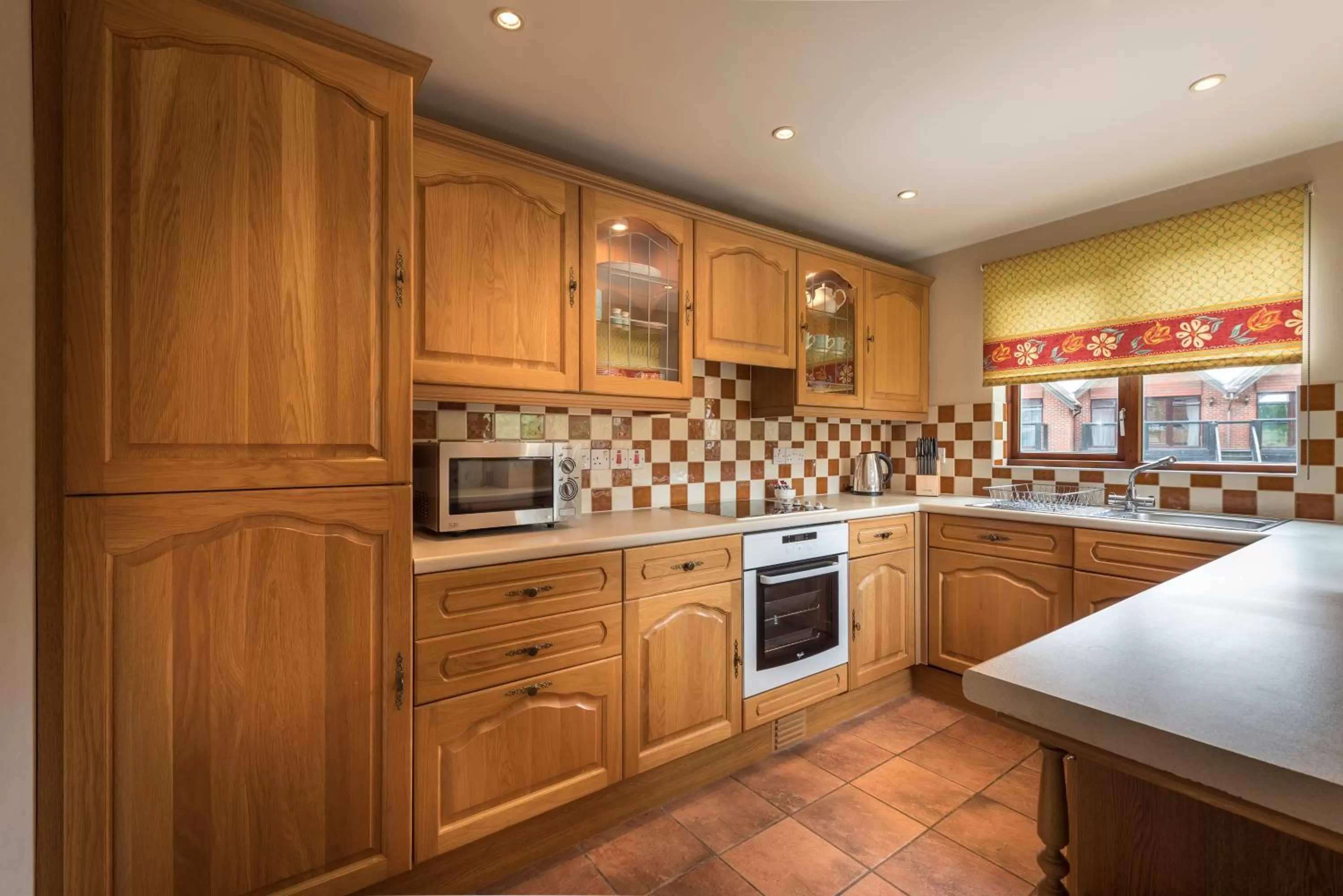 Kitchen or kitchenette, Kitchen/Kitchenette in Macdonald Elmers Court Resort