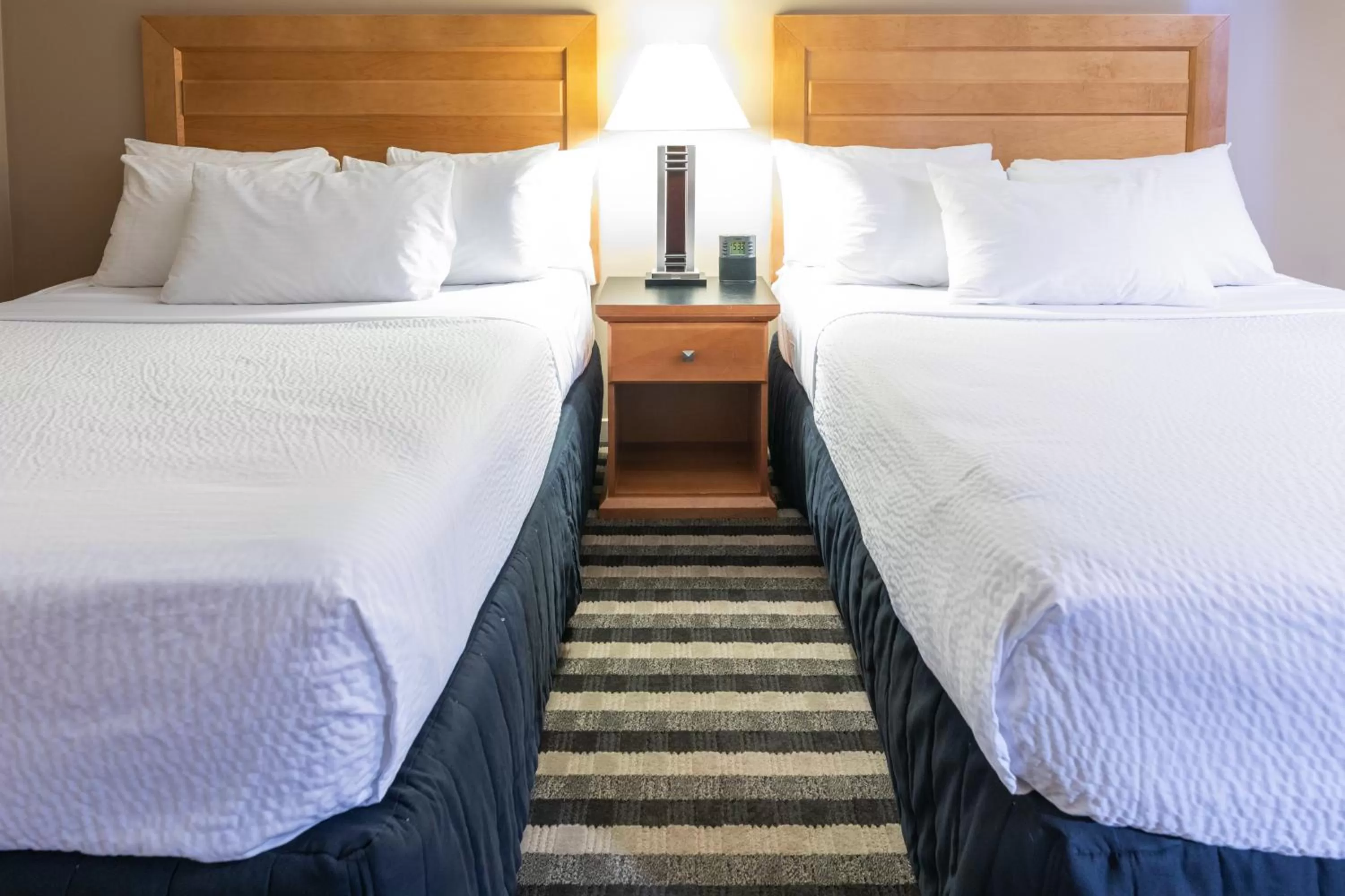 Bed in Royal Hotel West Edmonton, Trademark Collection by Wyndham