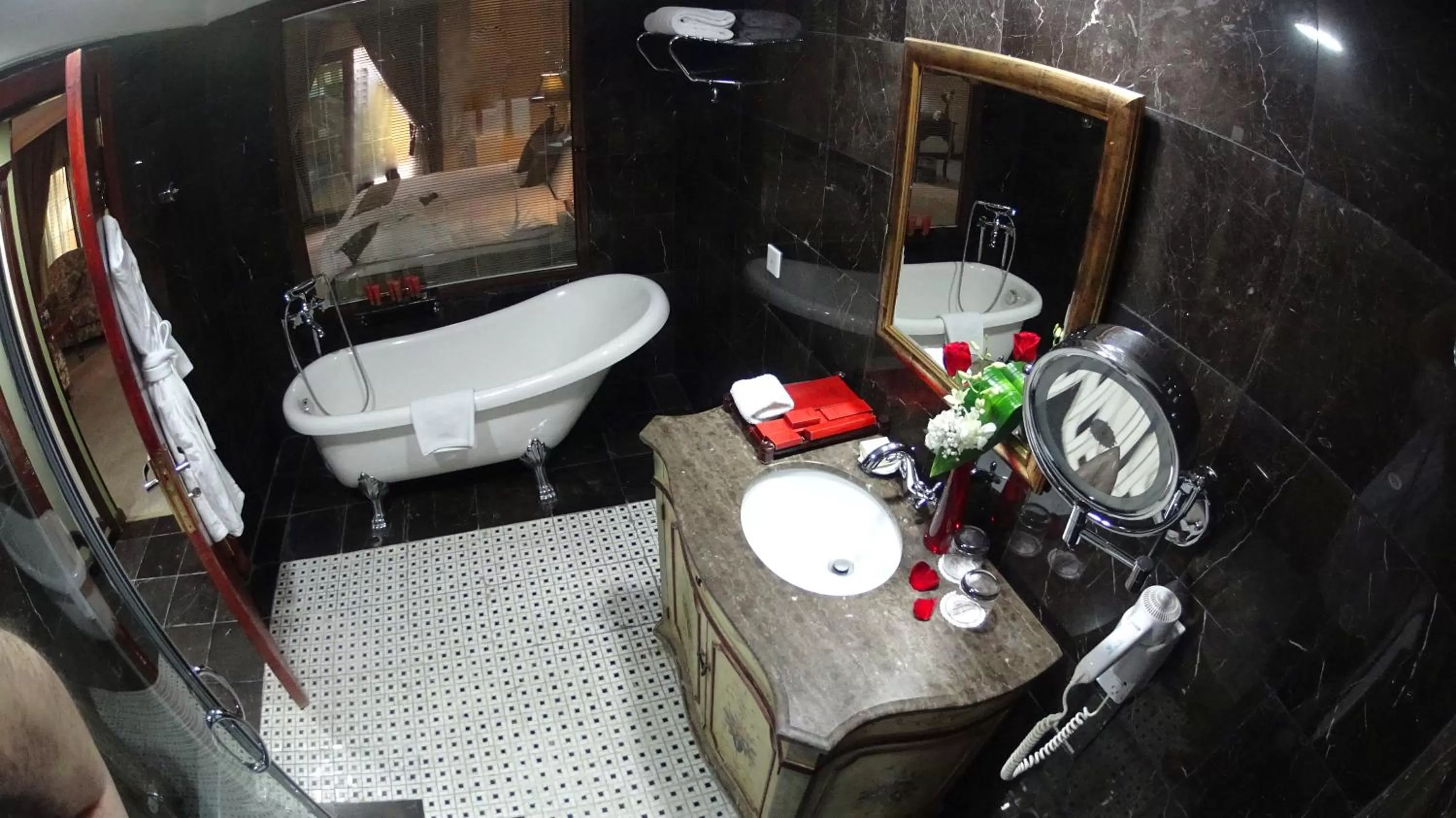 Bathroom in The Convention Center & Royal Suites Hotel