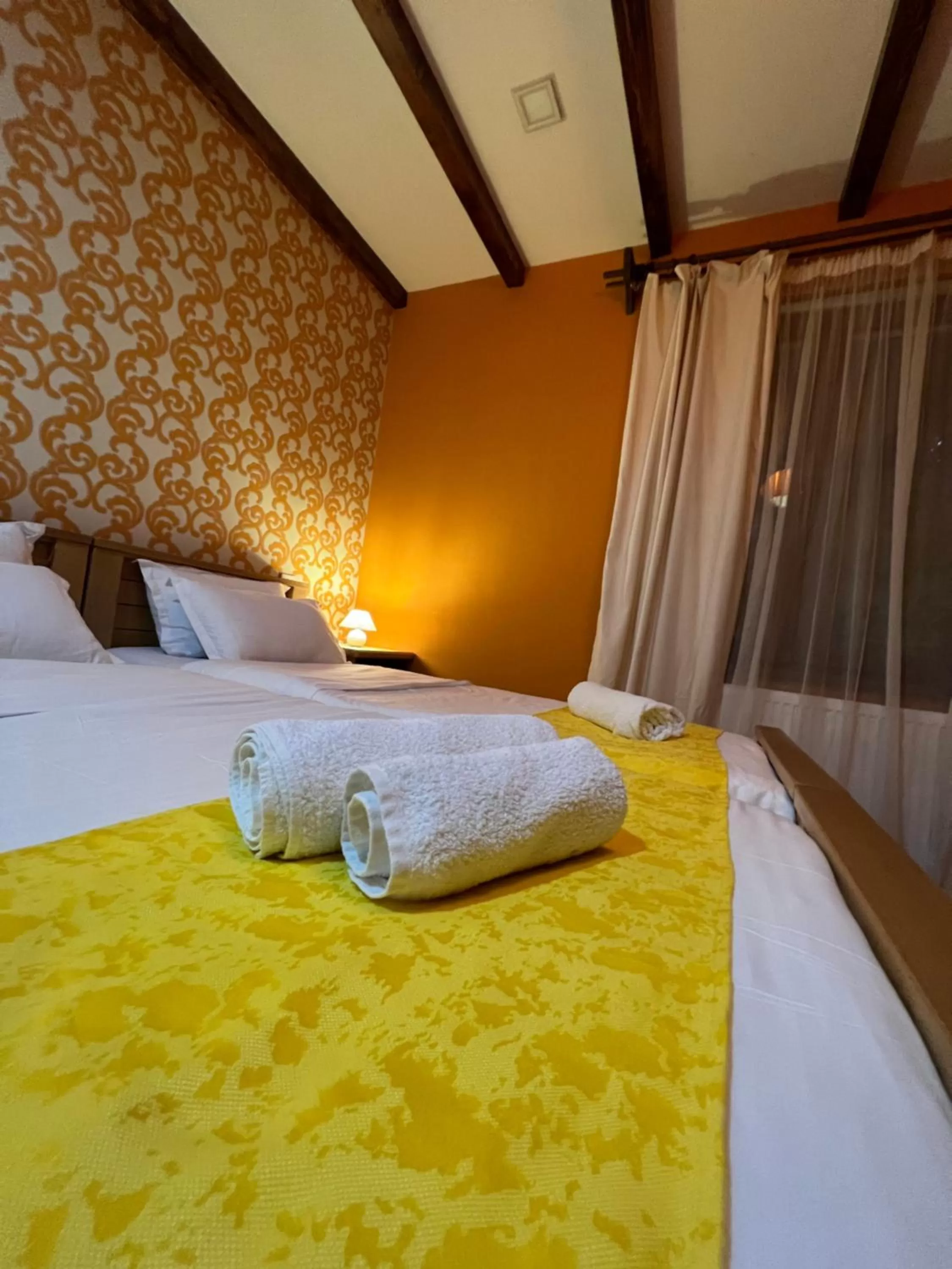 Bed in Borjomi Yellow Hotel