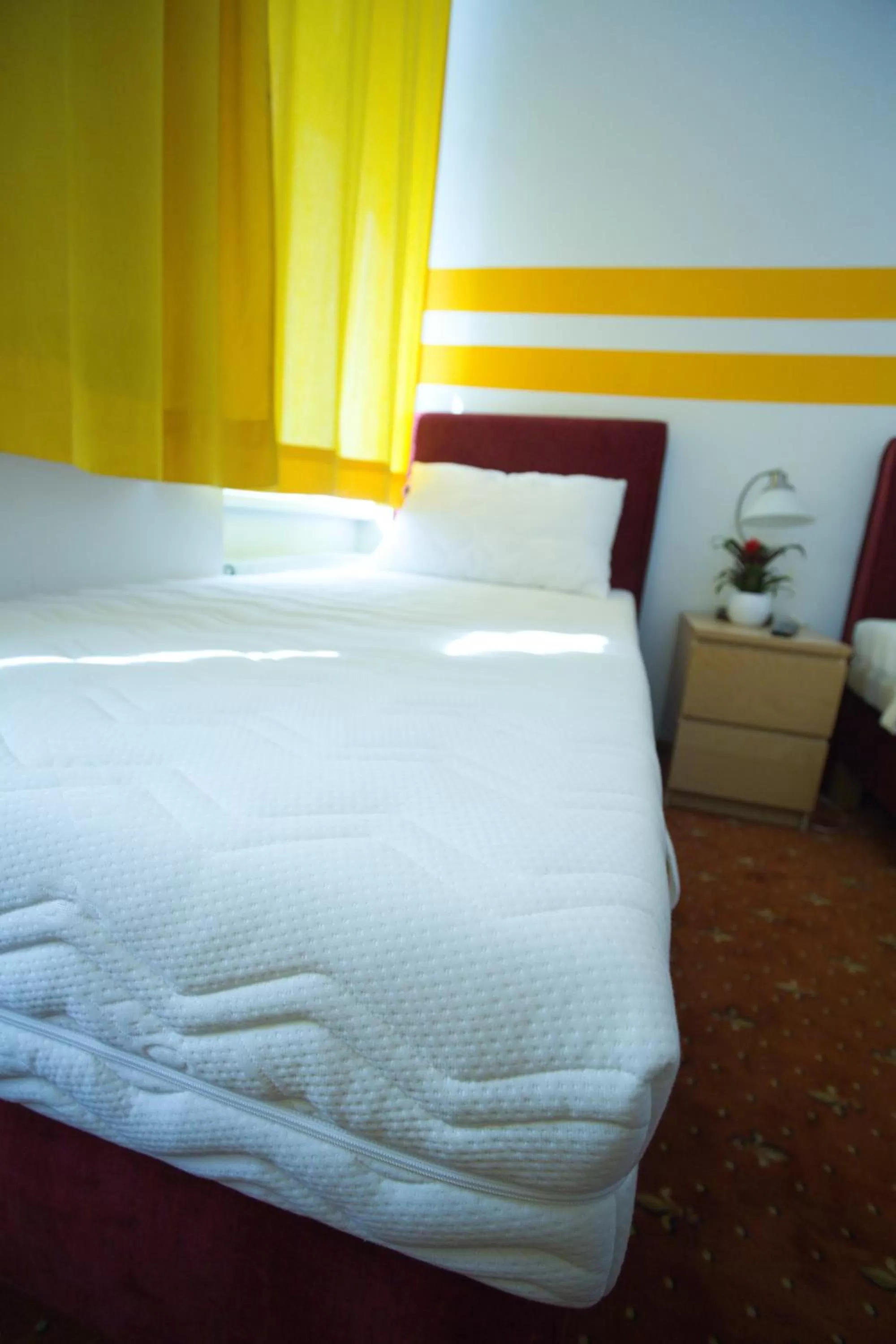 Bed in Hotel City Residence