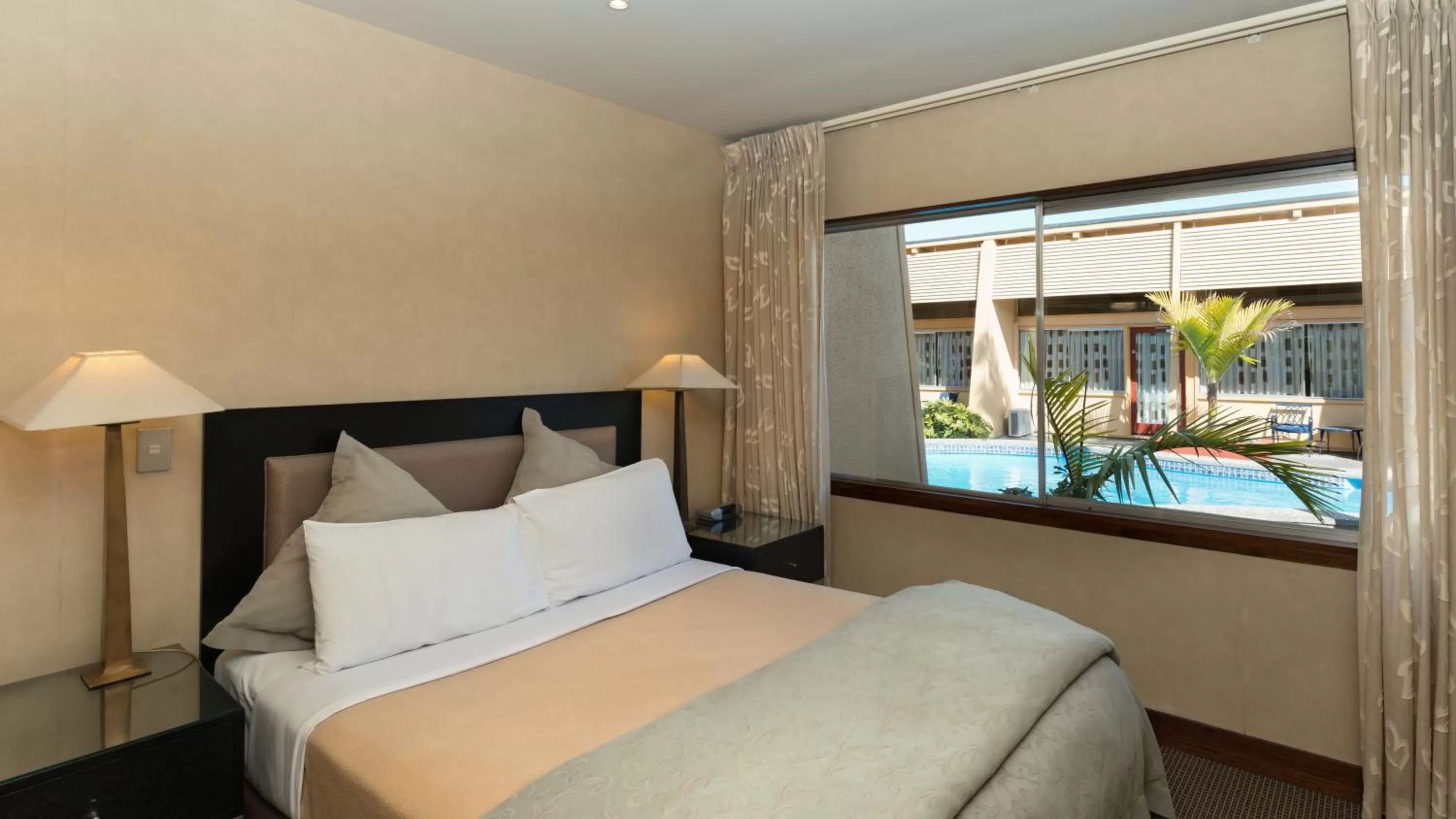 Day, Bed in Oasis Beach Motel