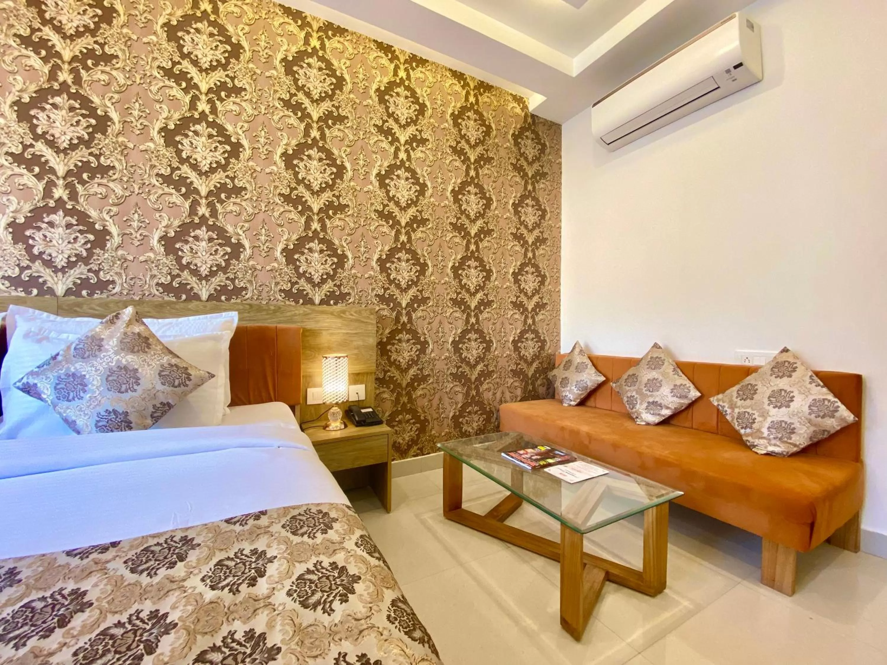 Seating area, Bed in Arogyadham Wellness Retreat