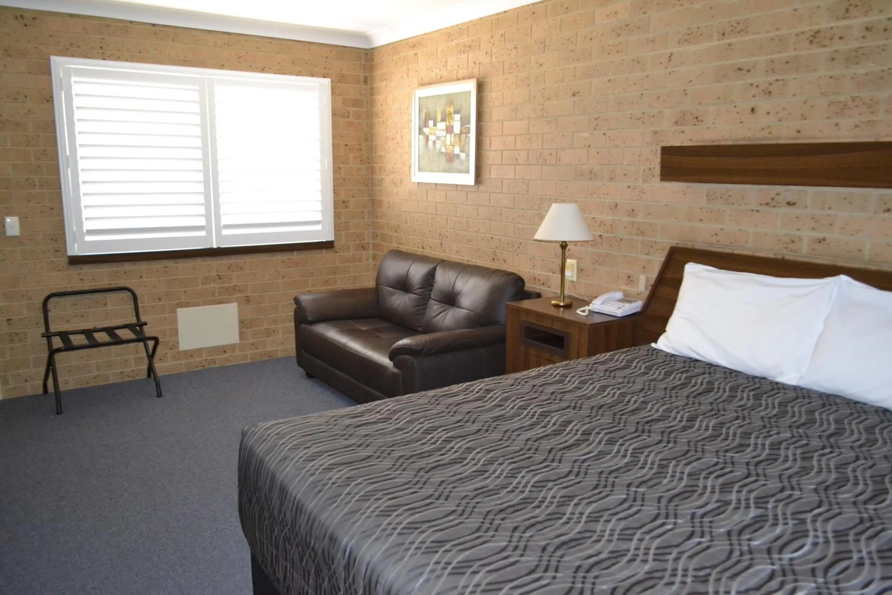 Bed in Tamworth Motor Inn & Cabins