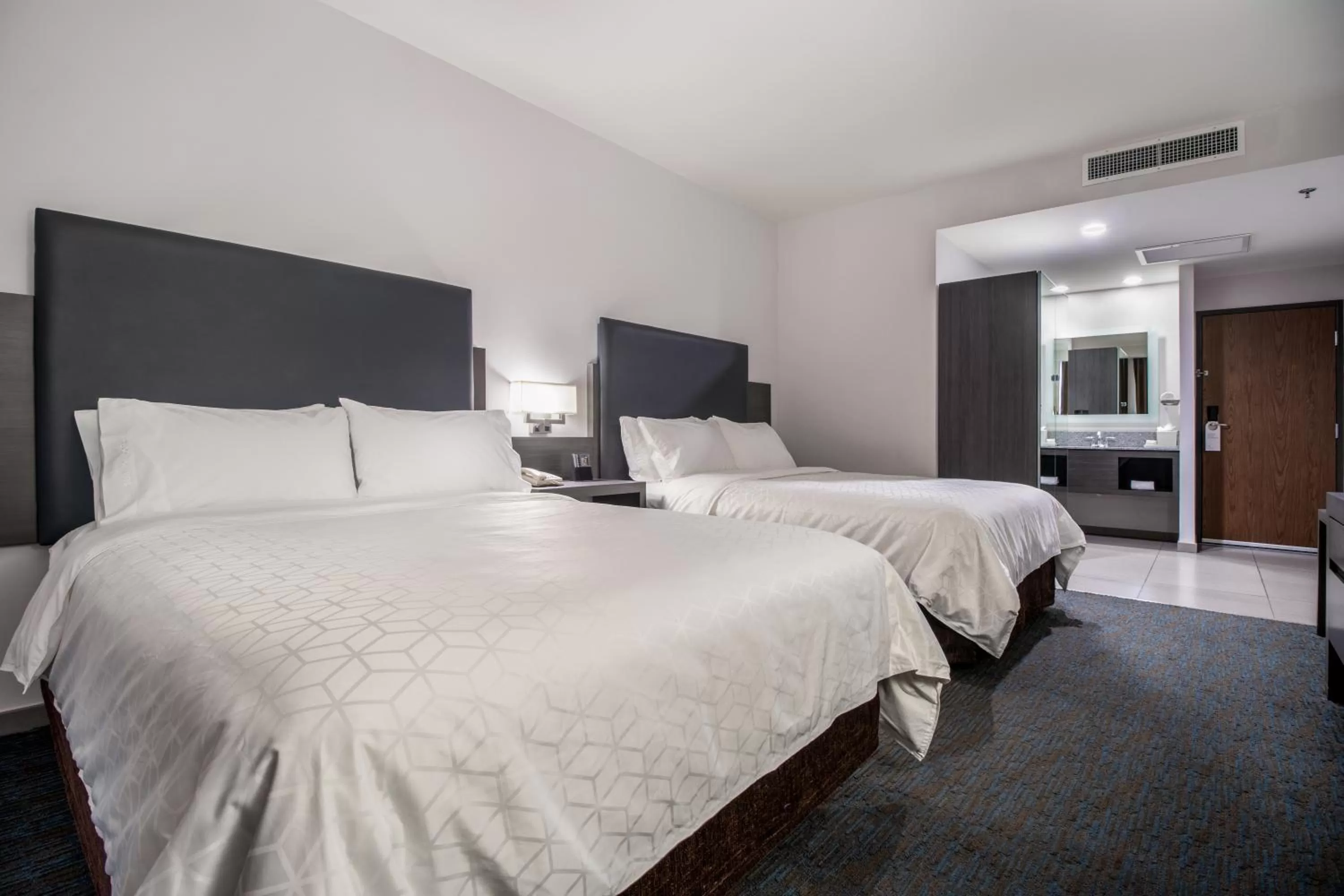 Bed in Holiday Inn Express Hotel & Suites Hermosillo by IHG