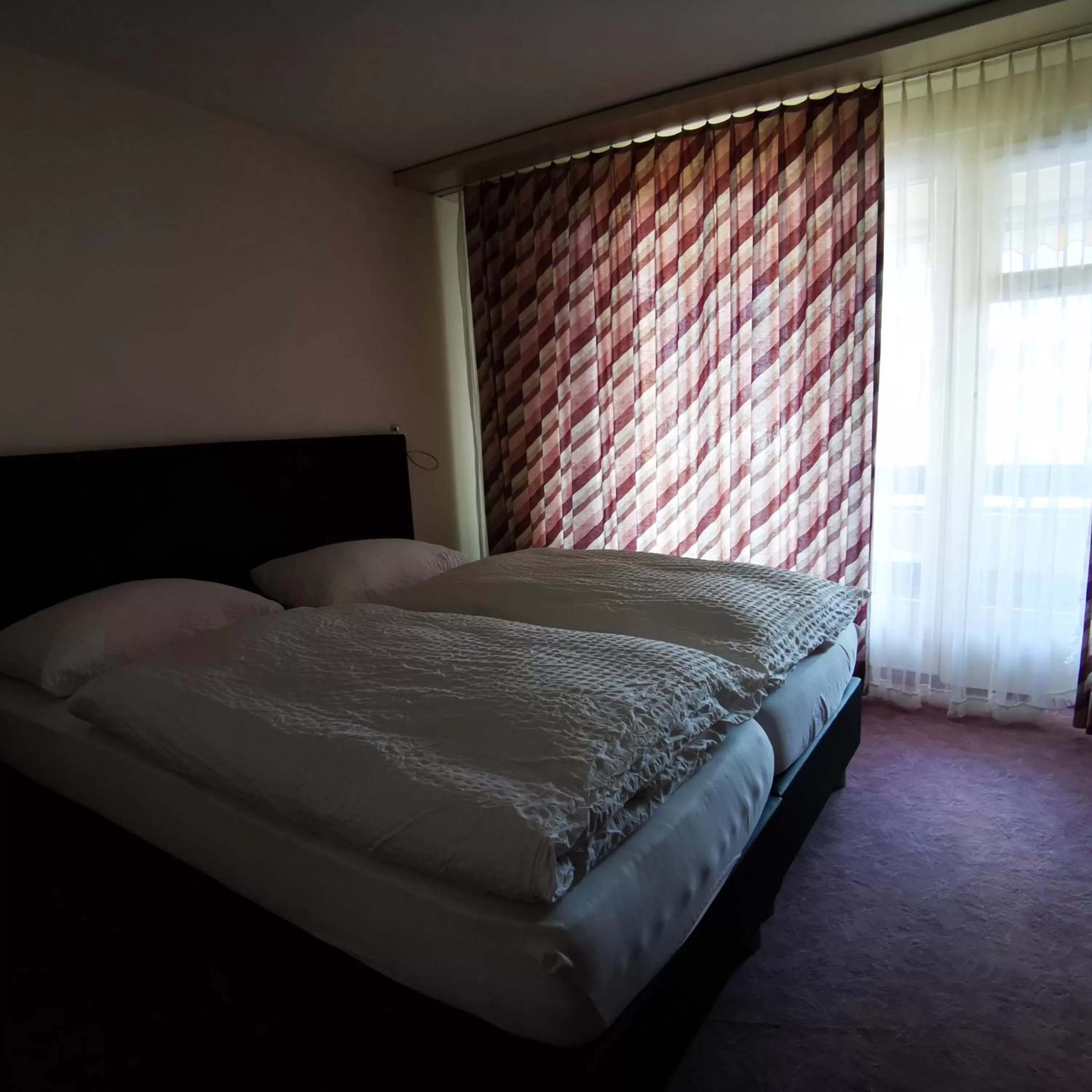 Bed in Hotel Crystal