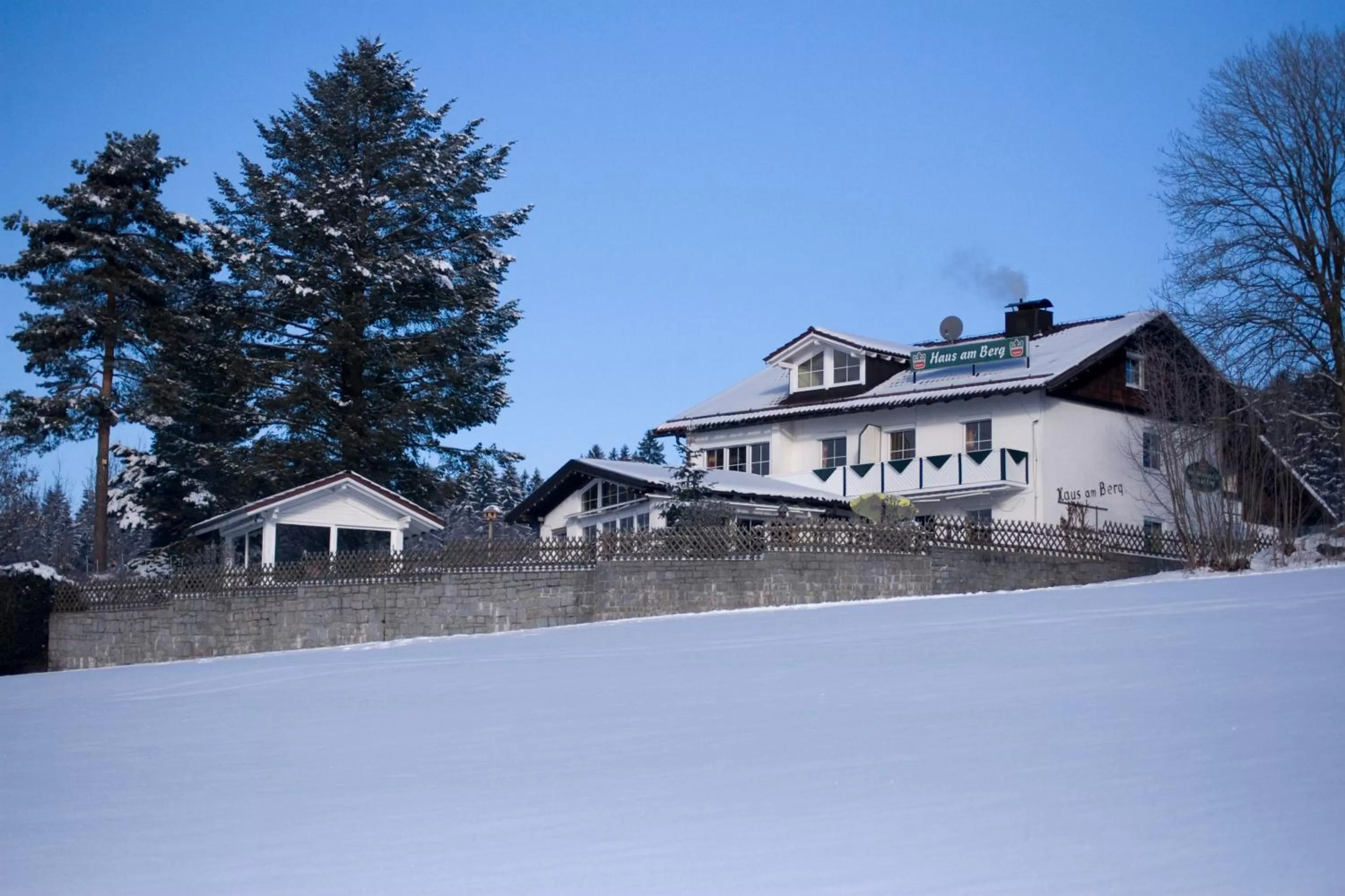 Property building, Winter in Hotel "Haus am Berg"