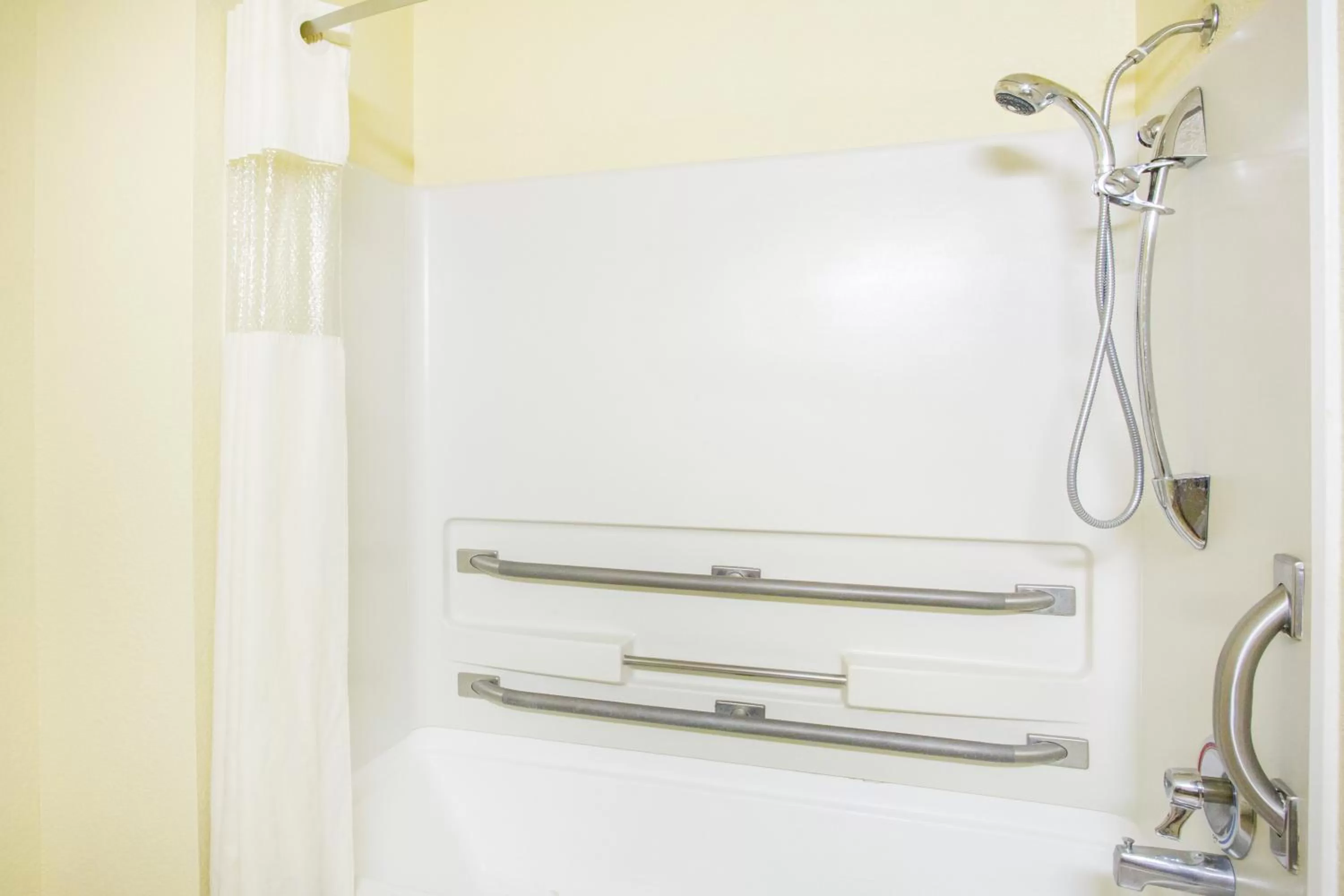 Shower in Super 8 by Wyndham Kingman