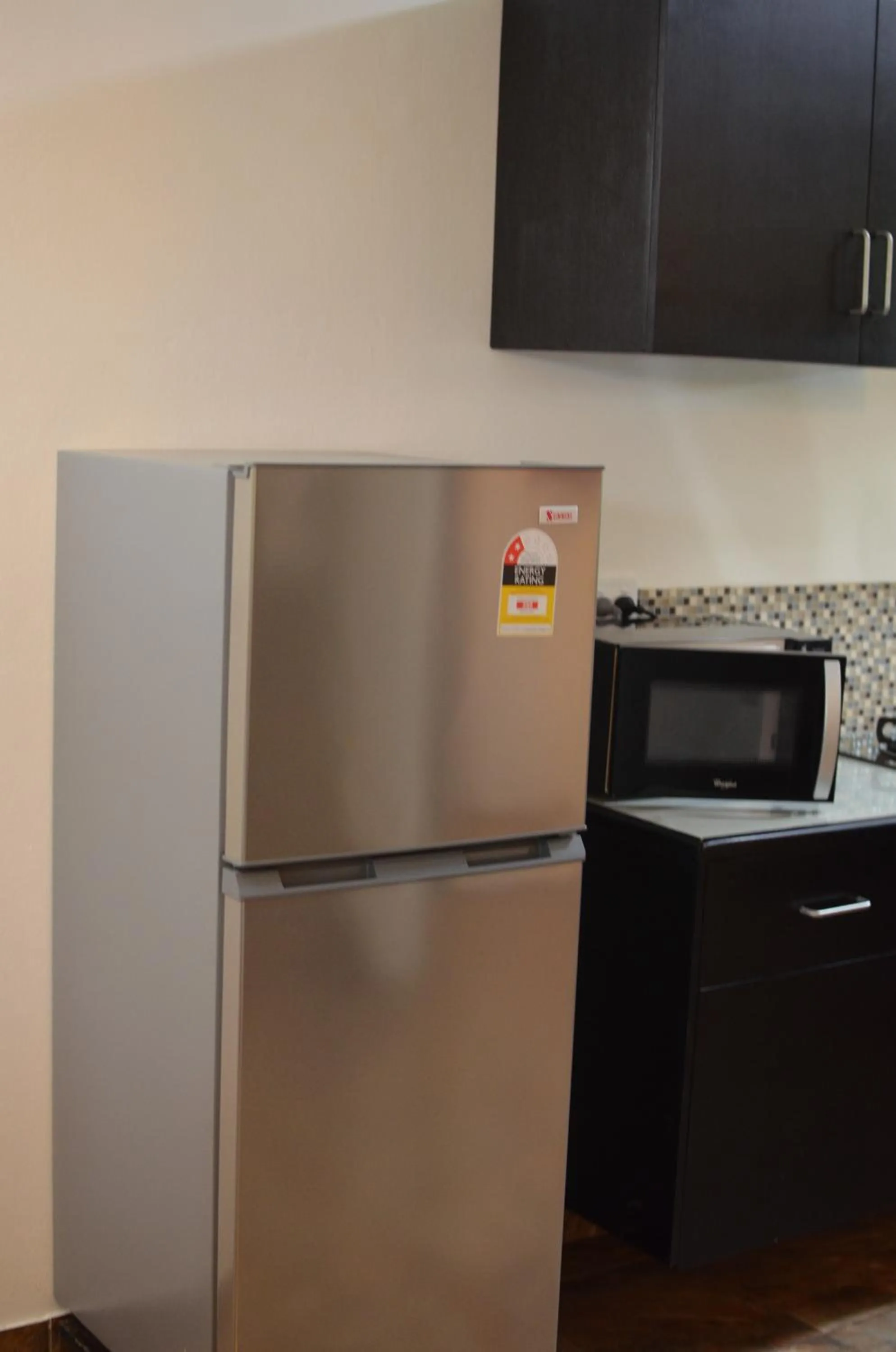 Kitchen or kitchenette in Grand West Villas