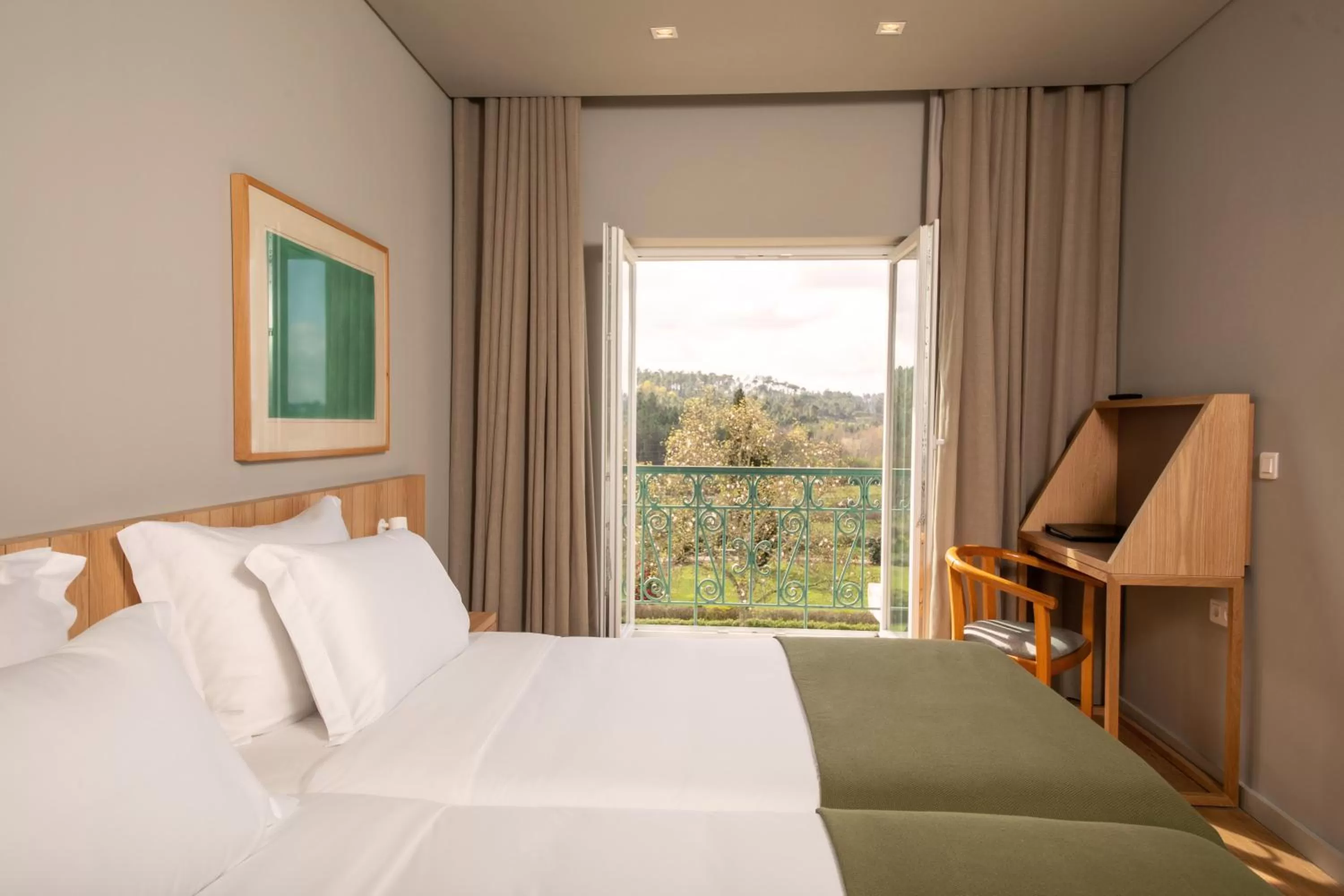 Bed in Montebelo Principe Perfeito Viseu Garden Hotel